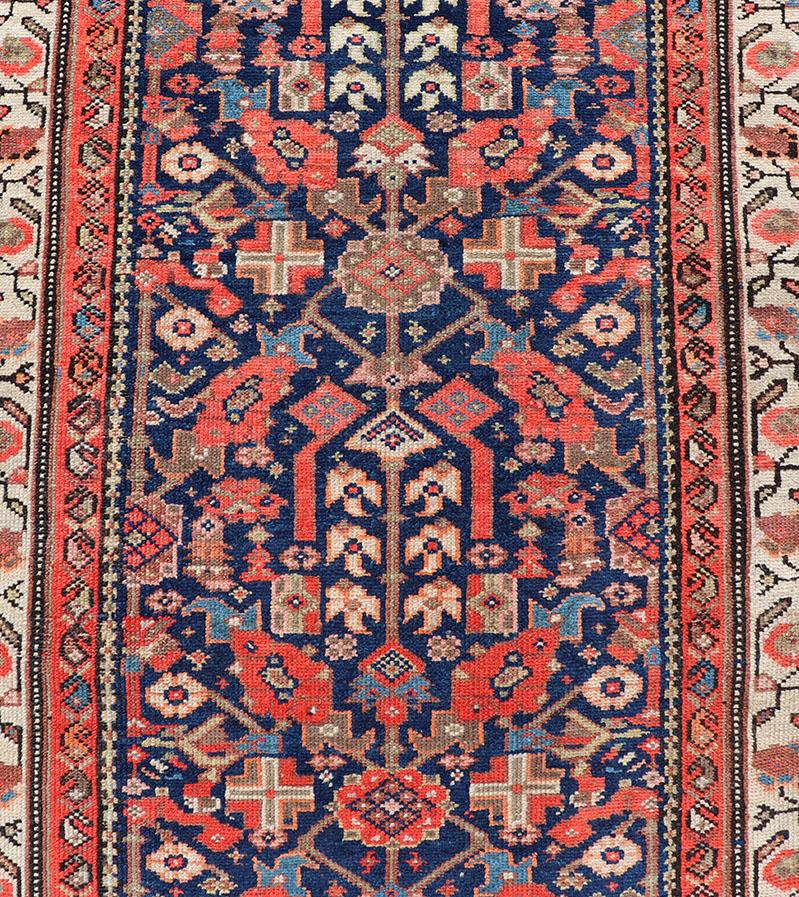 20th Century Antique Malayer Long Runner in Orange, Blue and Brown For Sale