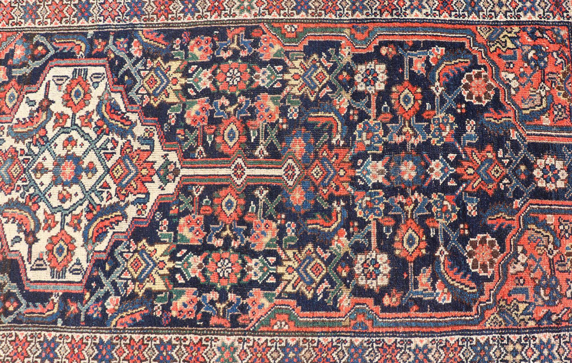 Antique Malayer Runner, rug PTA-21016, country of origin / type: Persian / Malayer, circa Early-20th Century.

Measures: 3'4'' x 16'0''.

This magnificent antique Persian Malayer, woven in the 1920s, features a stunning tri-medallion design upon