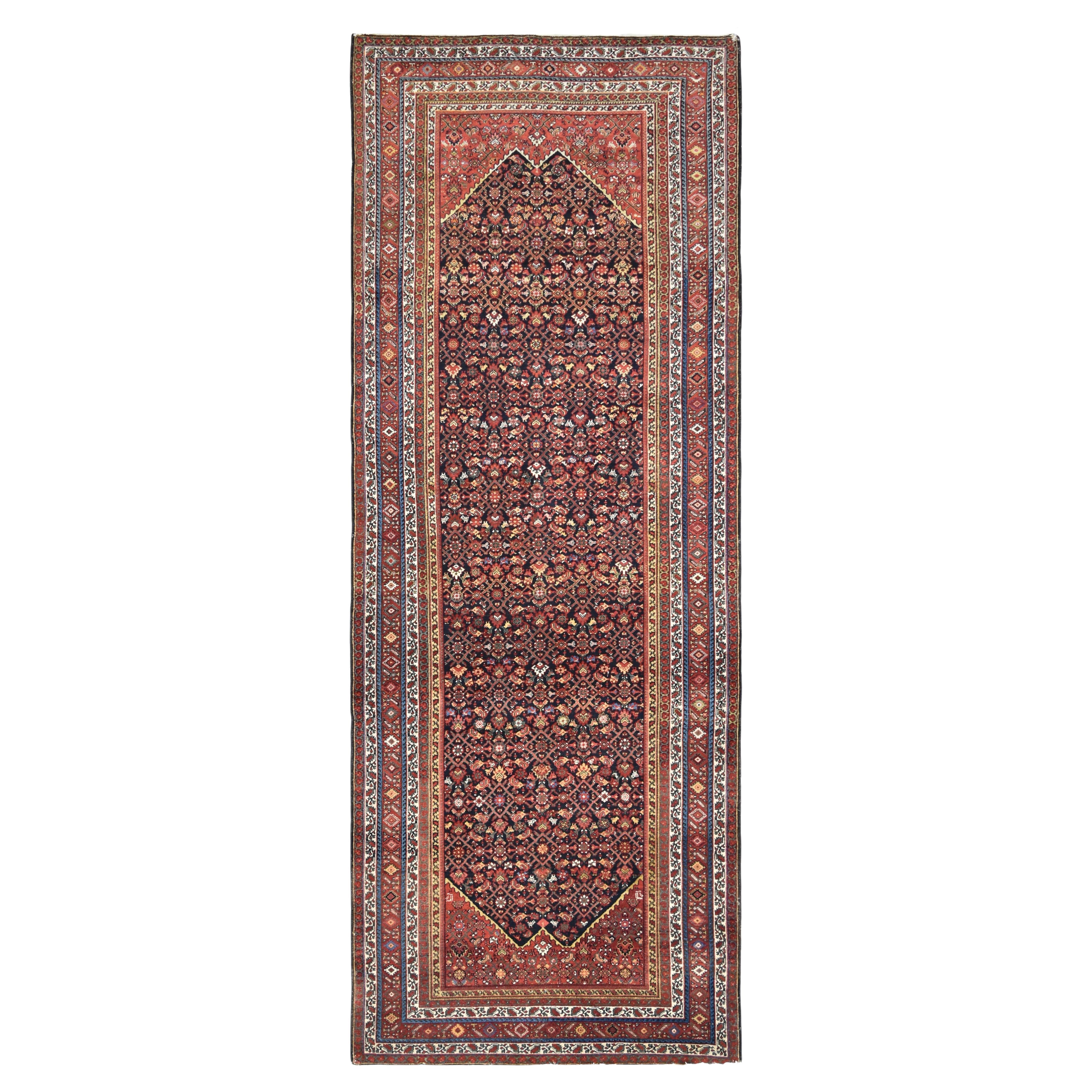 Antiker geometrischer Malayer-Wollteppich in Rot und Marineblau 5'9''x15'10'' um 1920 im Angebot