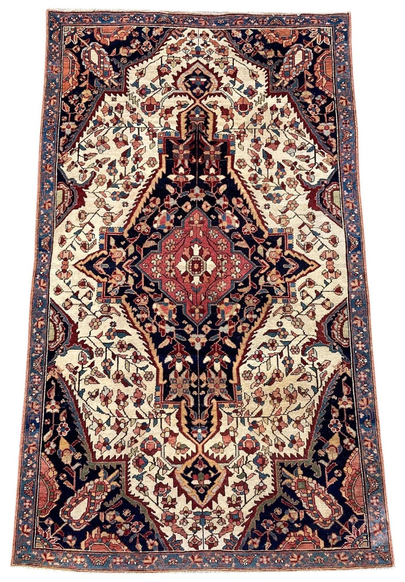 A lovely antique Malayer rug in a rare small size, handwoven circa 1900 with a single, large medallion design on an ivory floral field and great secondary colours. Very finely woven with very good quality wool.
Size: 1.66m x 0.98m (5ft 5in x 3ft