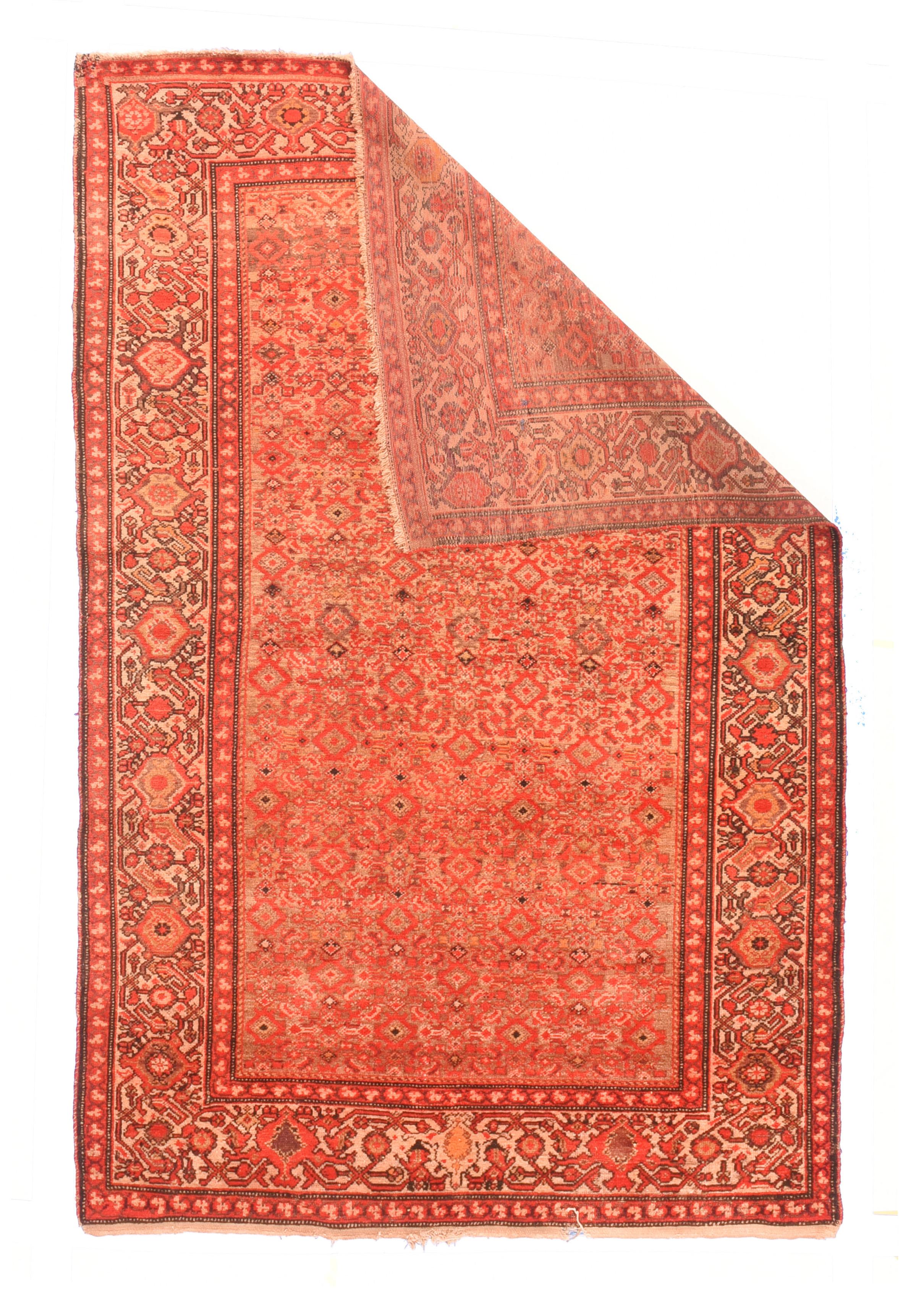 Antique Malayer Rug 4'4'' x 6'6''. This short-pile west Persian town scatter with a cotton foundation, single weft, and symmetric knots shows a distinctly abrashed beige field well-covered by a small allover Herati lancet leaf, open diamond and
