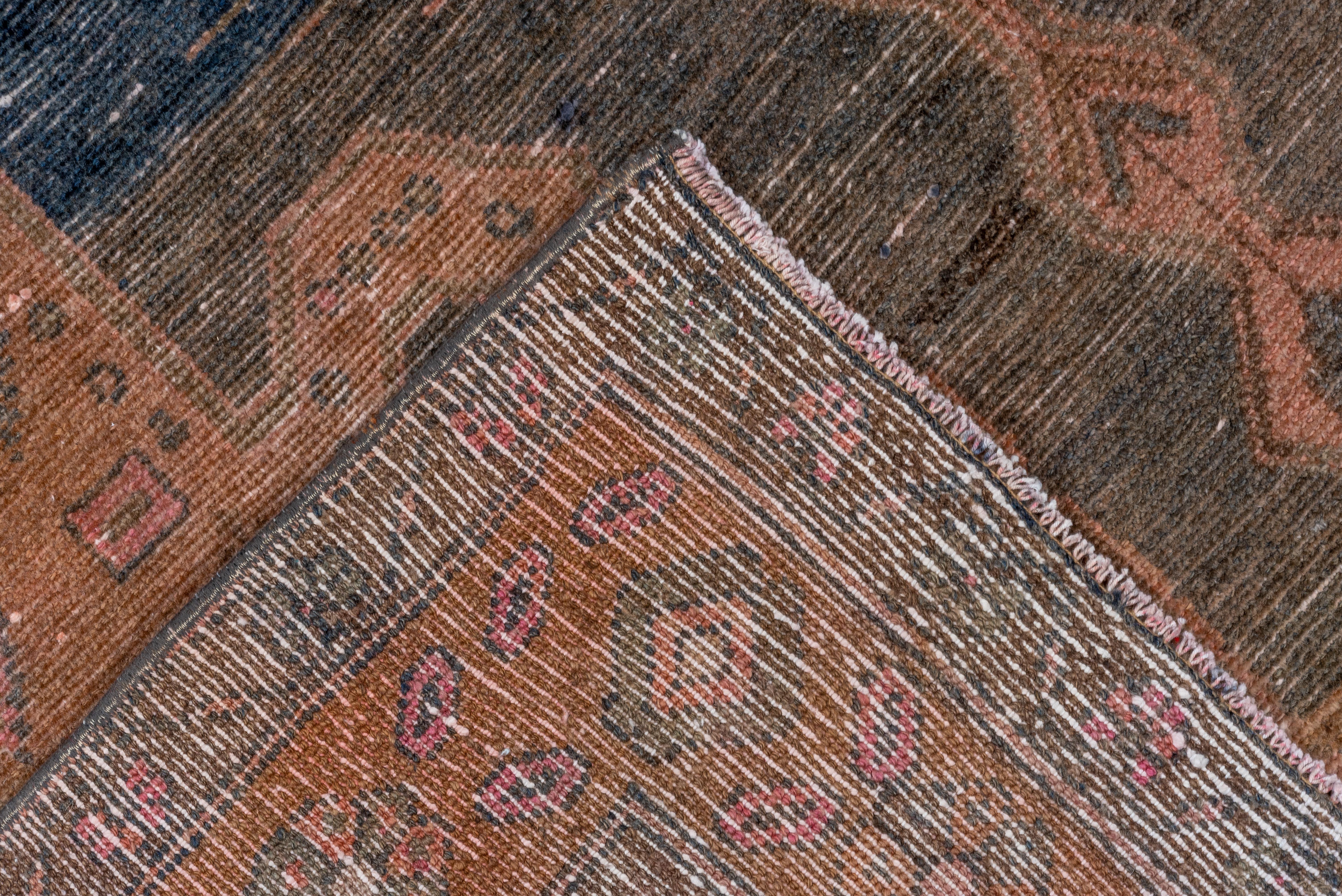 20th Century Antique Malayer Rug navy medallion on terracotta field For Sale