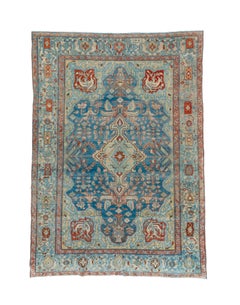 Tapis ancien de Malayer médaillon en saphir avec accents coralliens