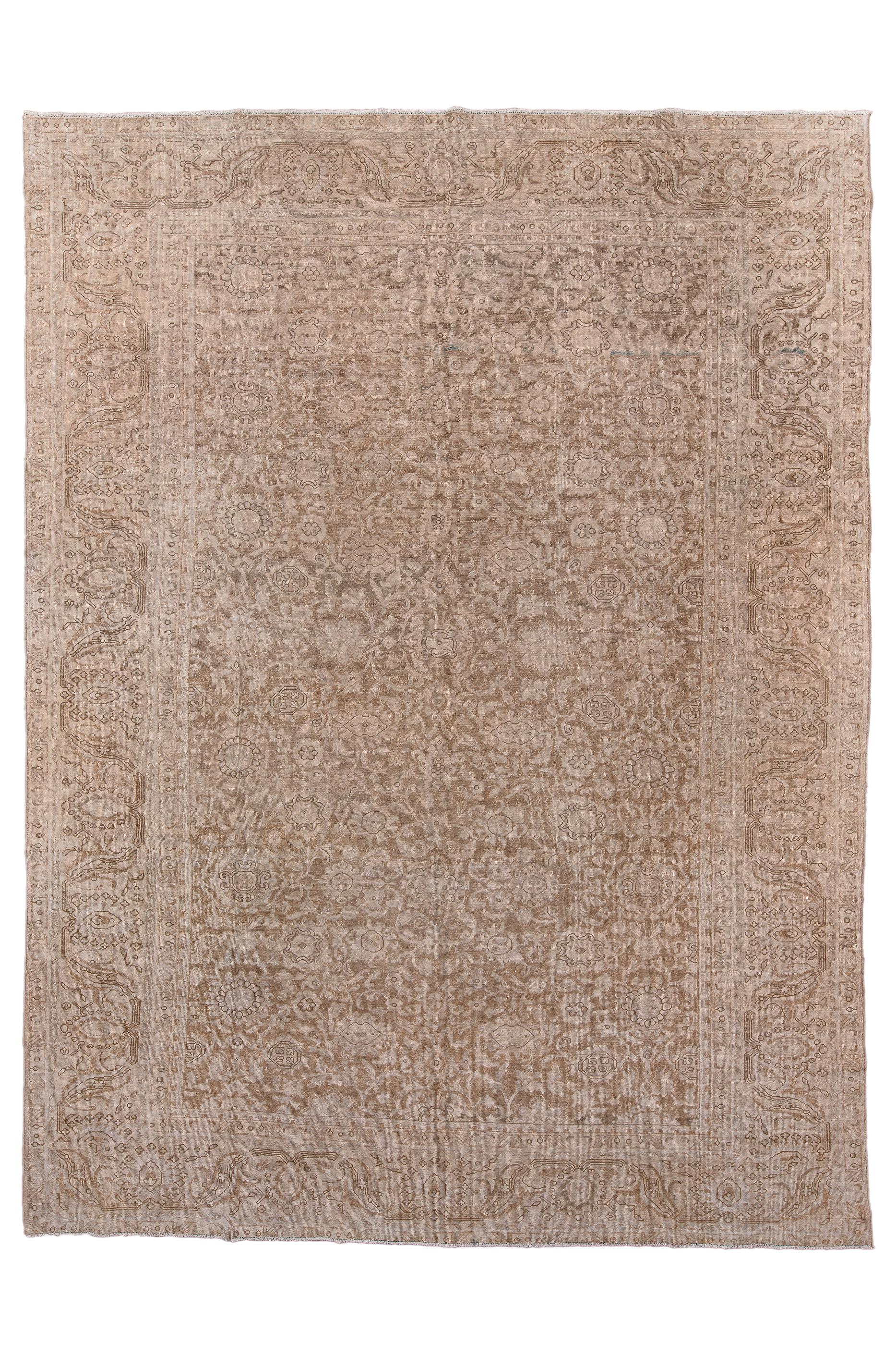 Malayer production exploded in terms of numbers and large sizes in the early 20th century in response to increasing export demand. Hence was born, as here, the “Mahalayer” carpet with the soft red field of the Mahal and an allover pattern including