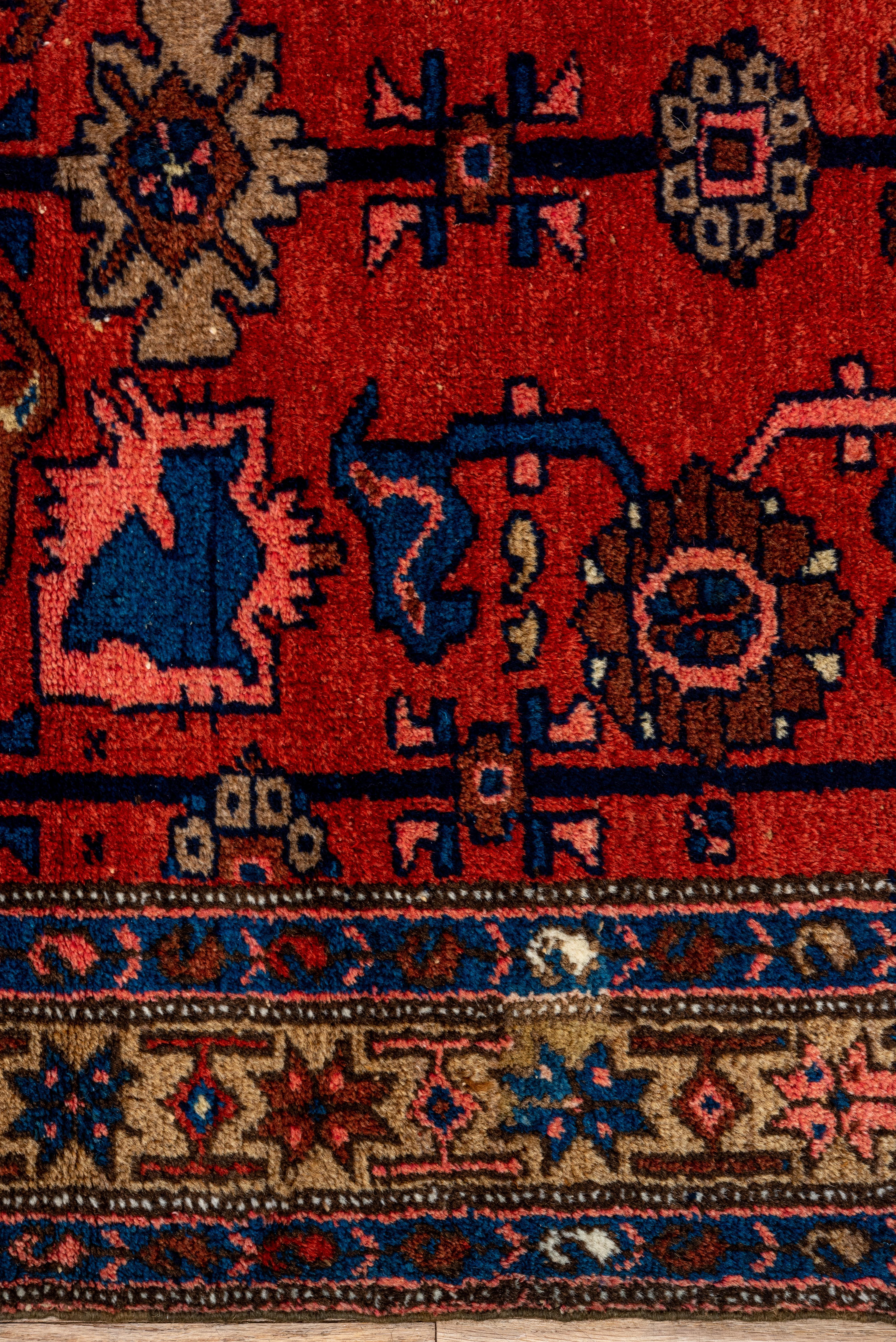 Wool Antique Malayer Runner – Crimson Field with Floral and Animal Motifs For Sale