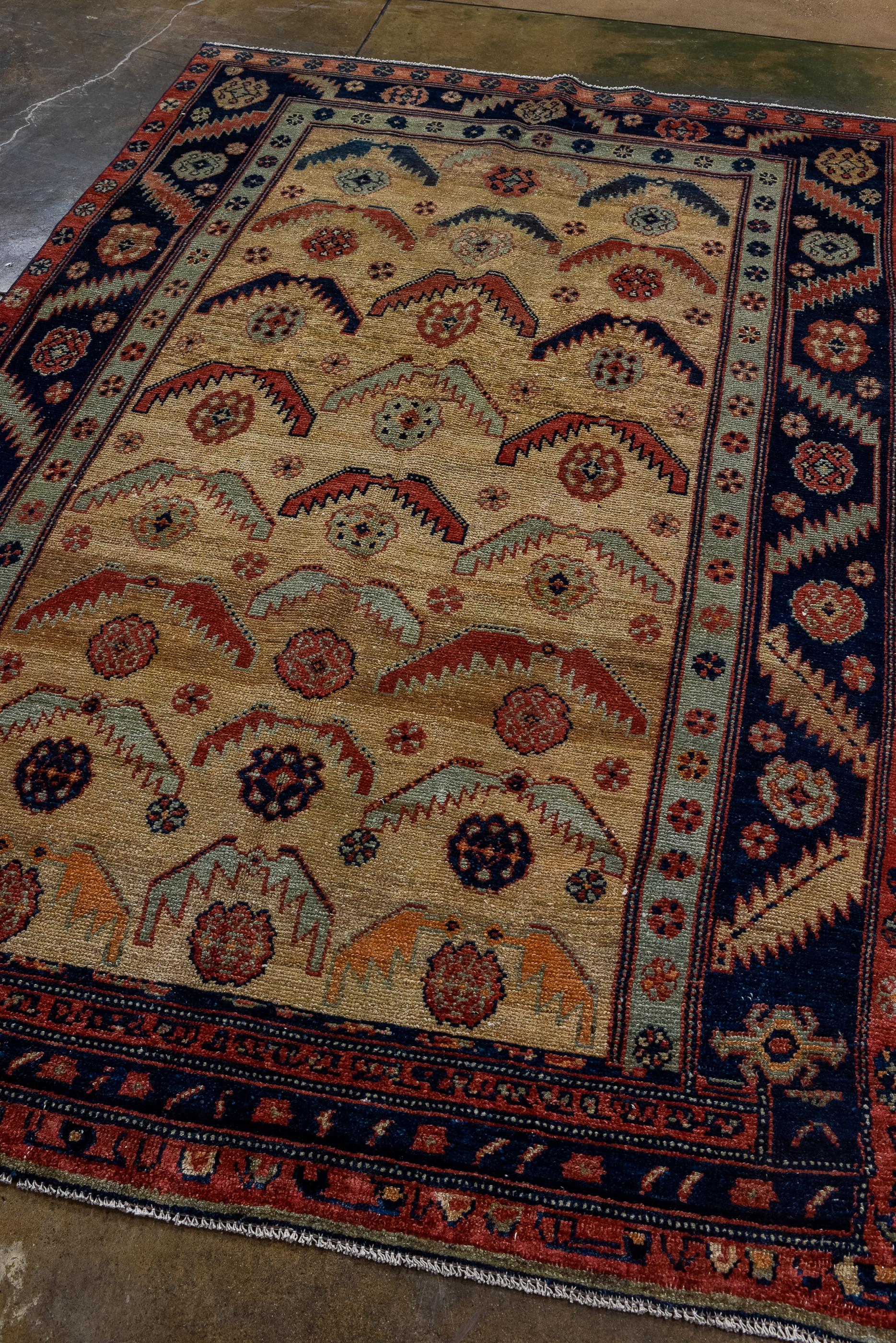 Persian Antique Malayer Village Rug with Camel Field and Rosette Design For Sale