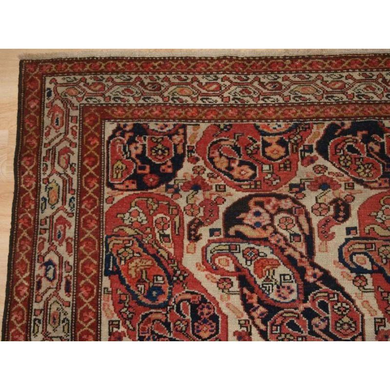 Asian Antique Malayer Village Rug with Mother Child Boteh Design, circa 1900 For Sale