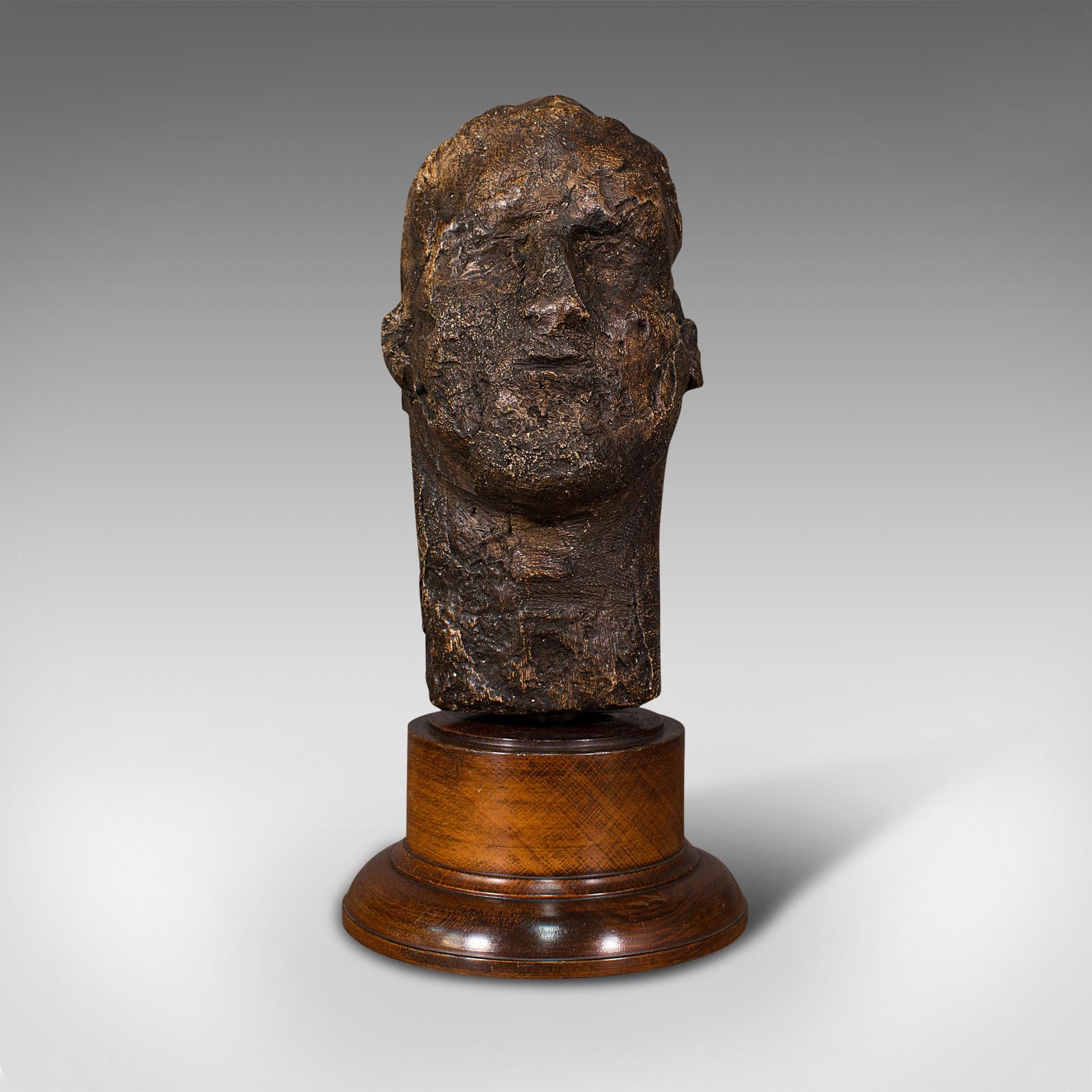 This is an antique male portrait bust. A Continental, plaster sculpture presented upon an oak base, dating to the mid Victorian period, circa 1860.

Of striking appearance with shimmering tones and raw finish
Displaying a desirable aged patina