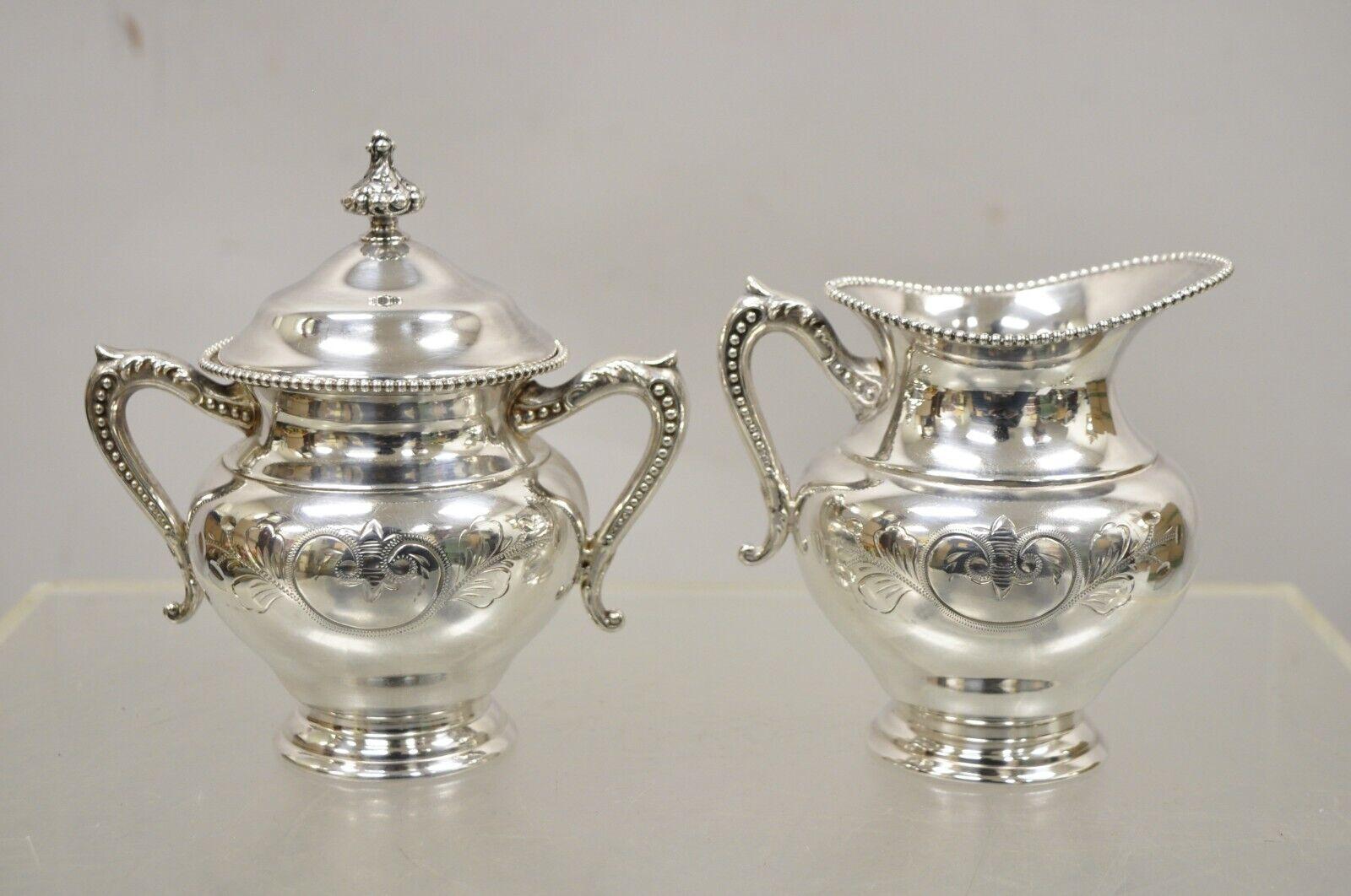 Victorien Service à thé en métal argenté Manhattan Antique Co - Ensemble de 4 pièces en vente