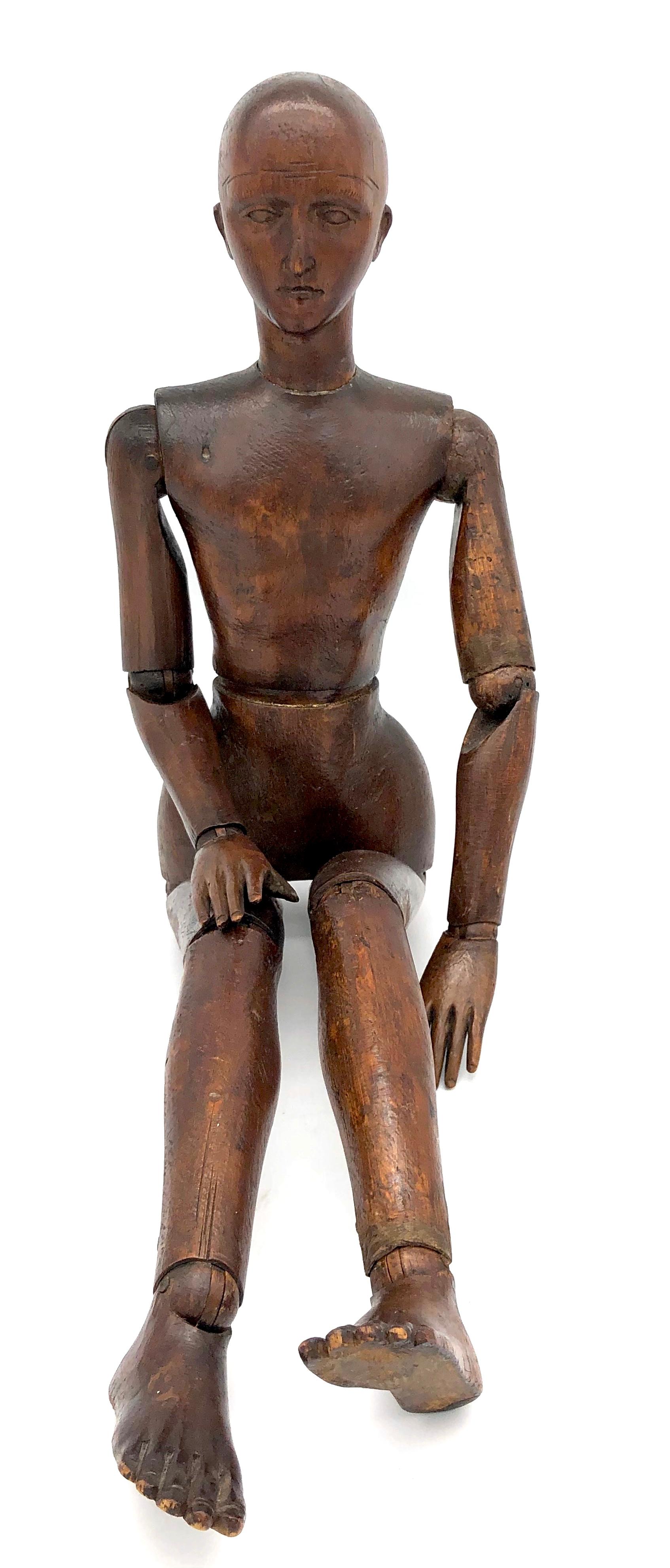 This rare early articulated mannequin is from an artist´s studio in Paris. It is made out of beechwood, patinated as mahogany. This highly unusual sculpture is exquisitely carved.
It was made in circa 1820.