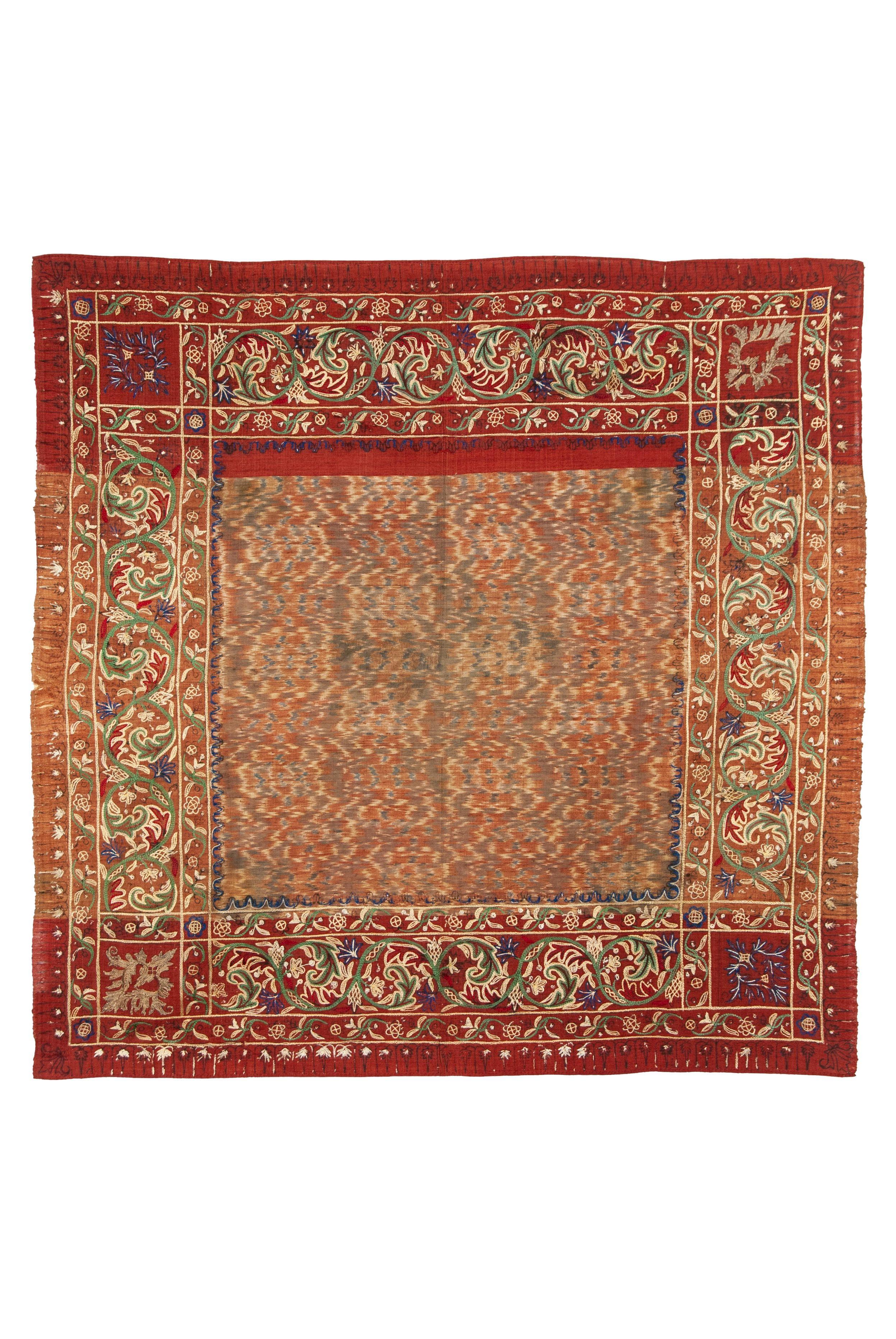 Antique Man's Ceremonial Head Cloth (Iket Kepala), South Sumatra
Malay people, Palembang region

A beautifully subtle weft ikat ceremonial head cloth with elaborate silk chain-stitch embroidery and couched gold-wrapped thread. This gold-wrapped
