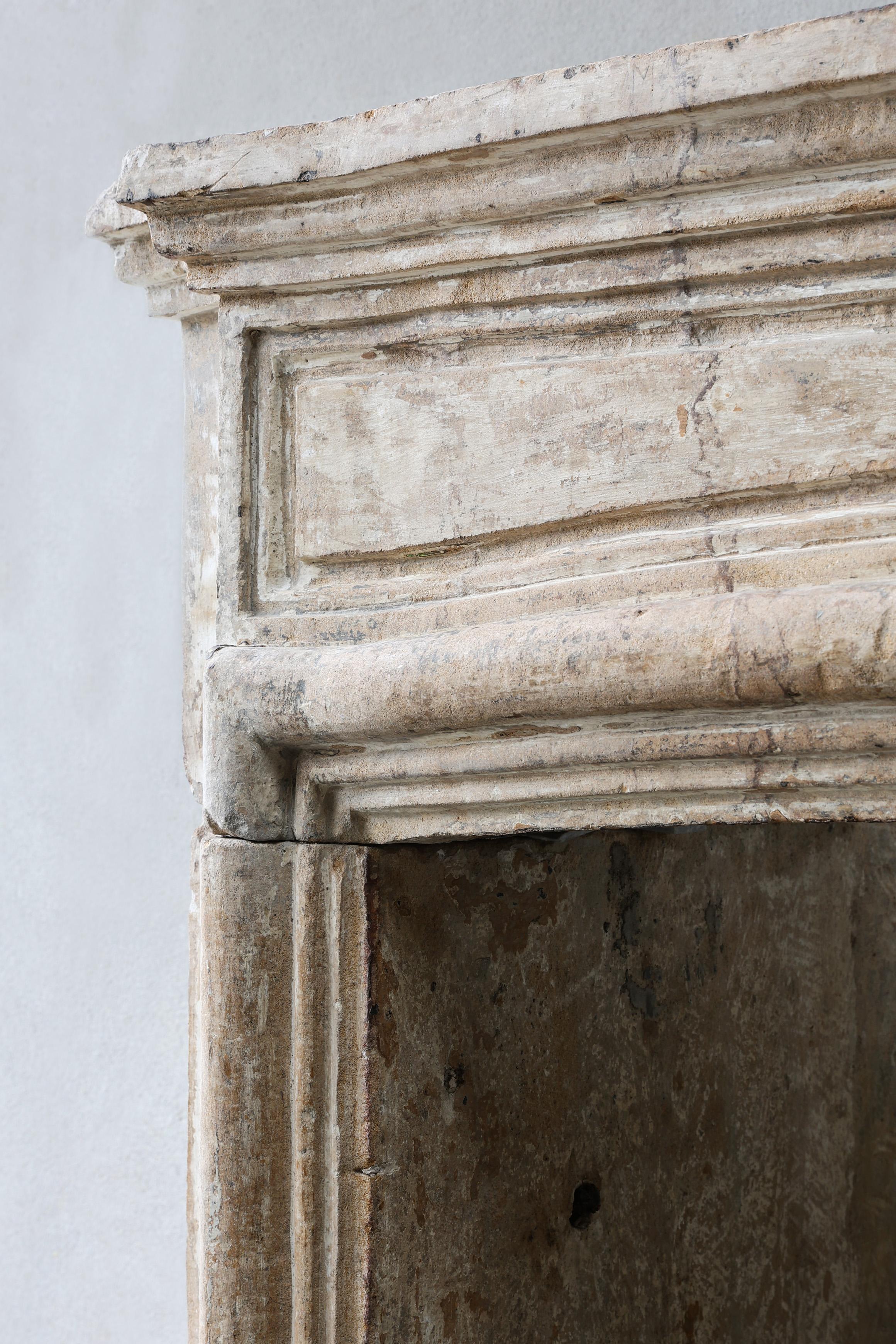 Antique mantel surround of French limestone, Louis XIV, 19th century For Sale 5