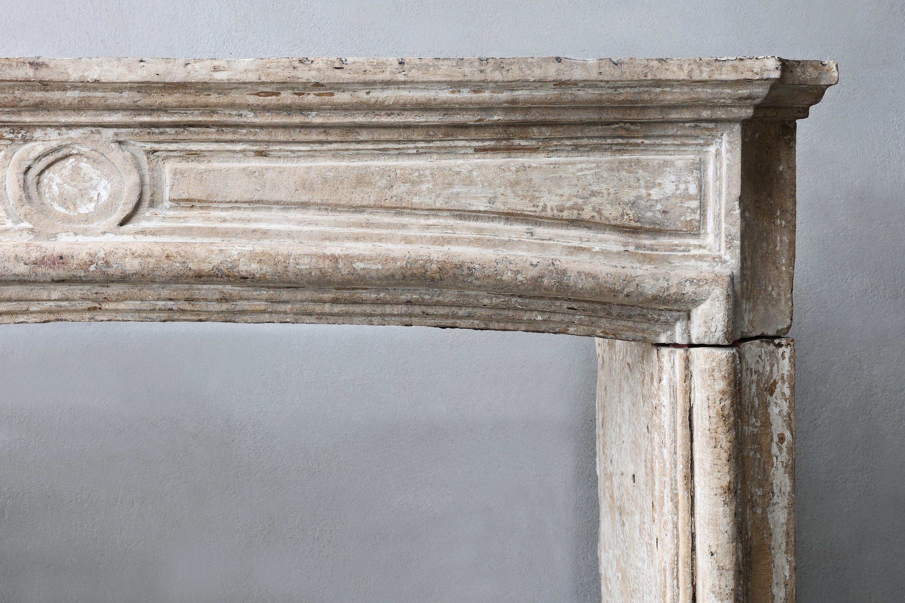Other Antique mantel surround of French limestone, Louis XIV, 19th century For Sale