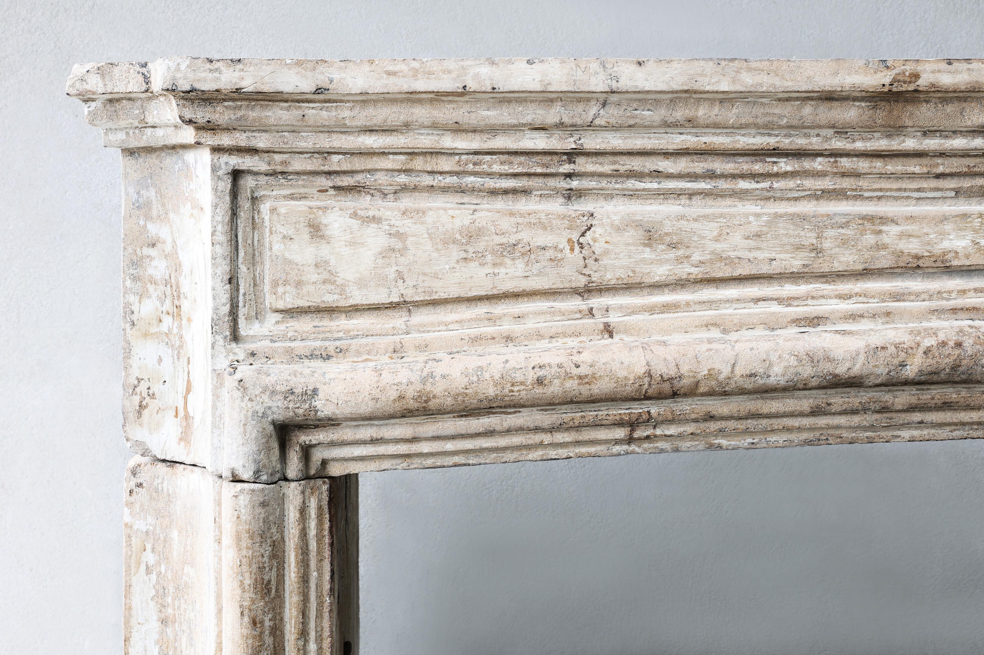 19th Century Antique mantel surround of French limestone, Louis XIV, 19th century For Sale