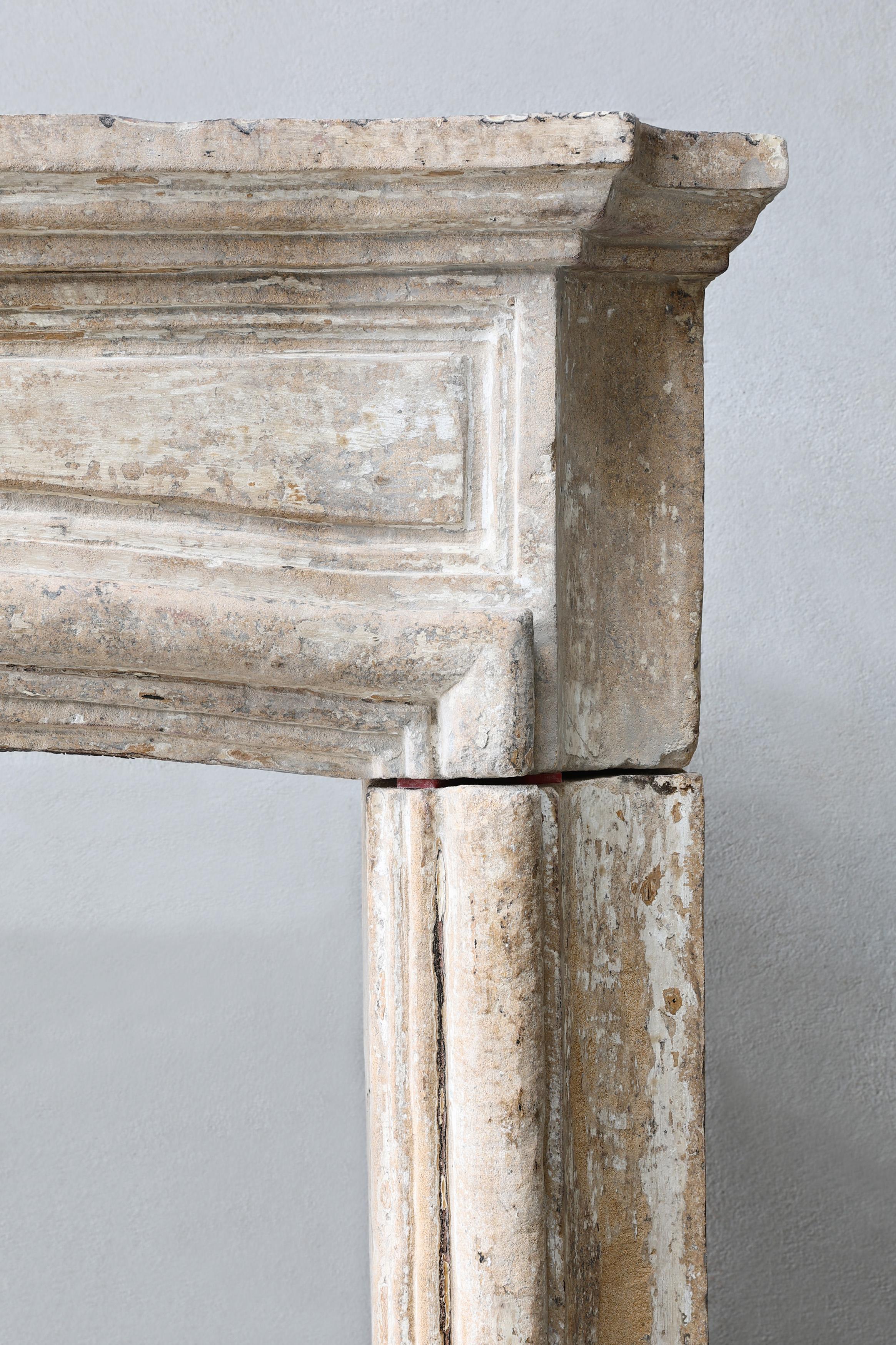 Antique mantel surround of French limestone, Louis XIV, 19th century For Sale 1