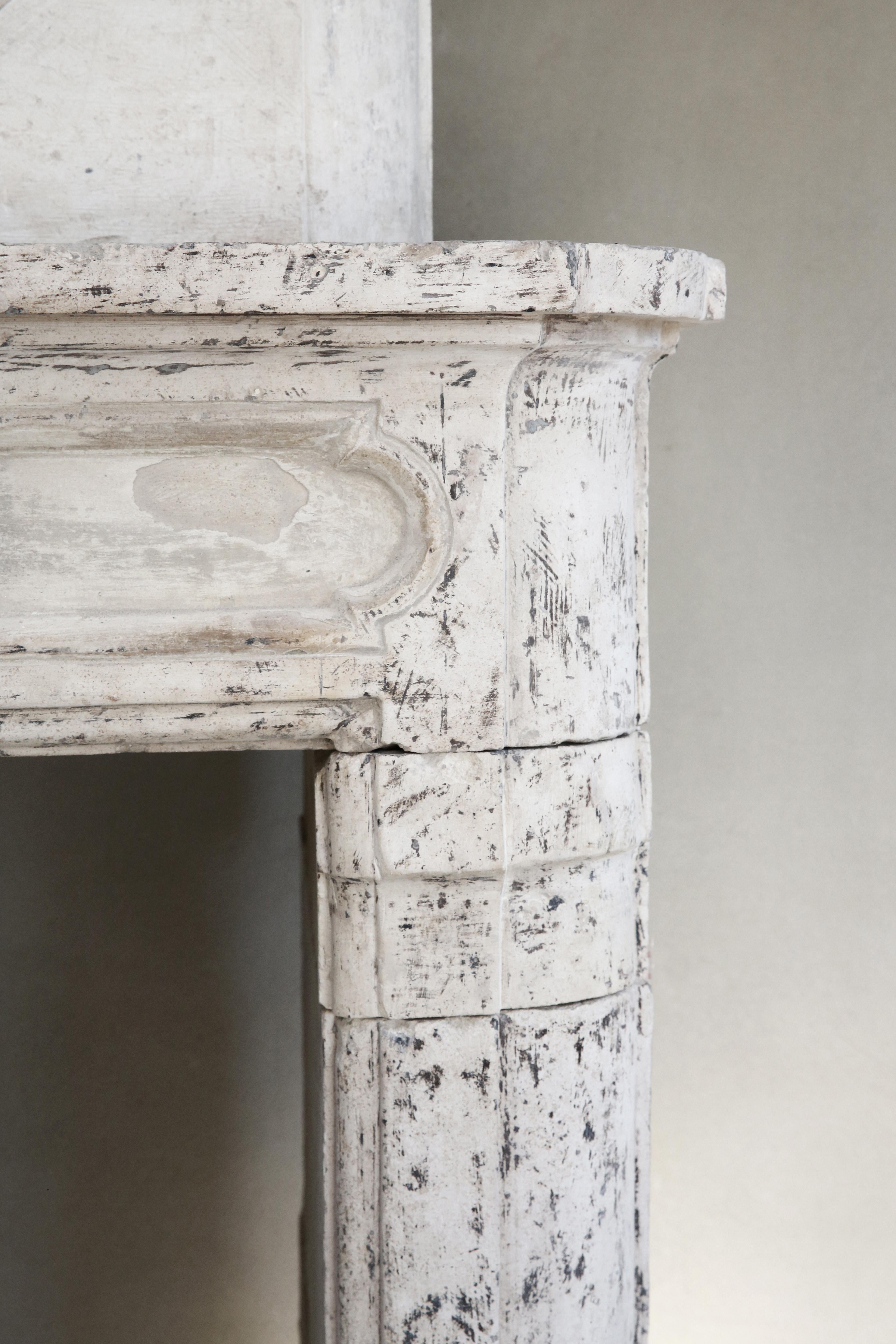 18th Century Mantel Surround of French Limestone with a Trumeau 1