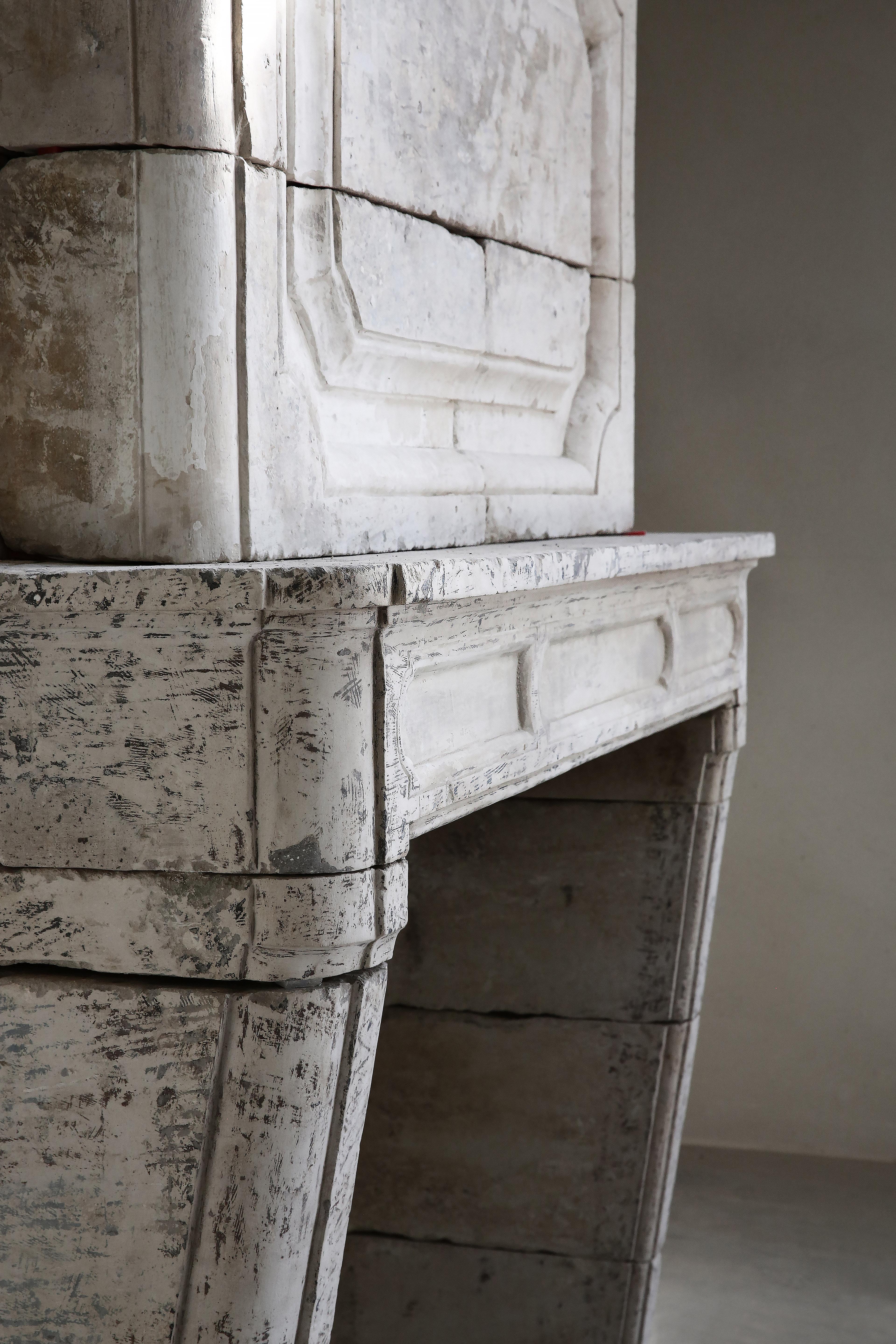 18th Century Mantel Surround of French Limestone with a Trumeau 3
