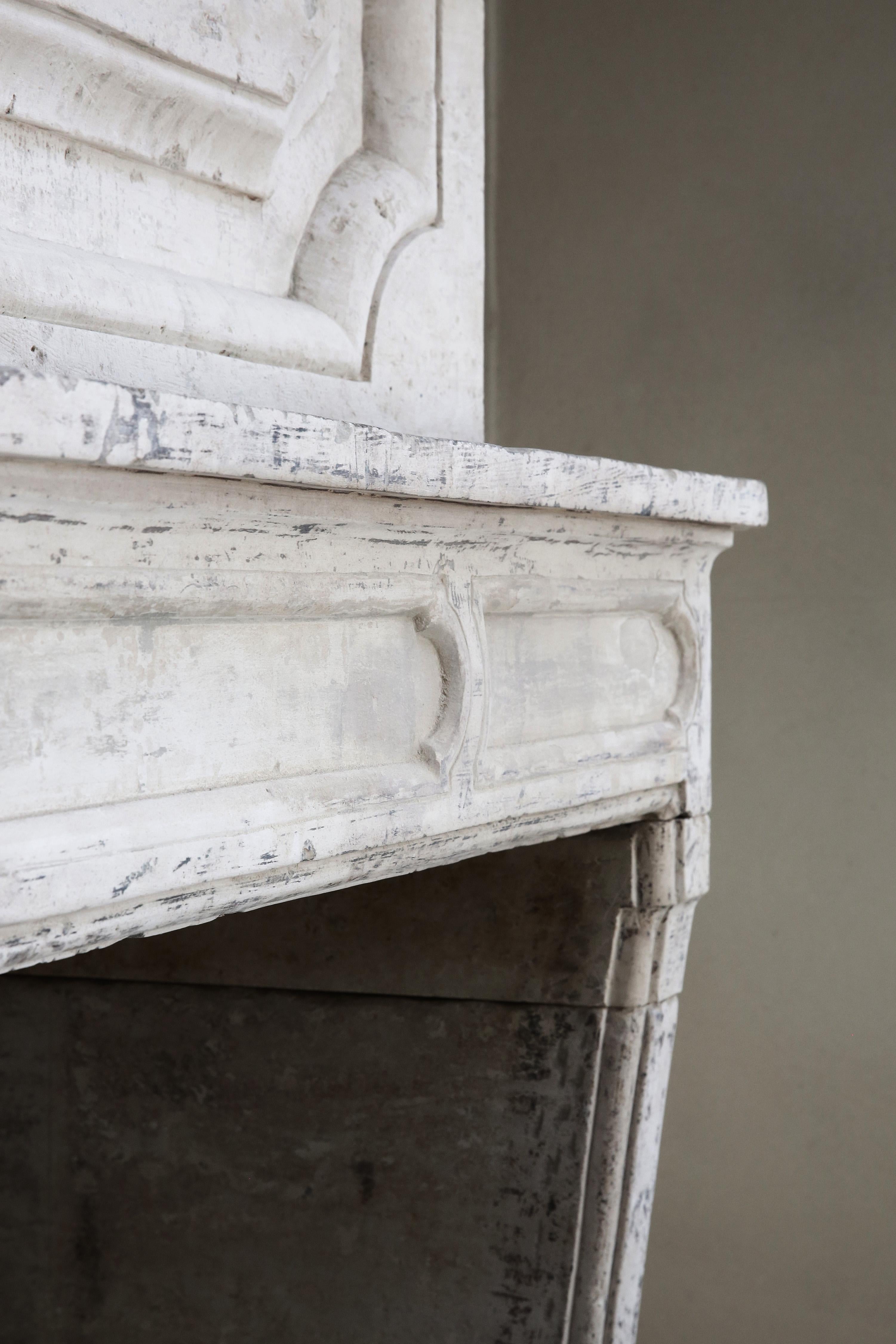 18th Century Mantel Surround of French Limestone with a Trumeau 4