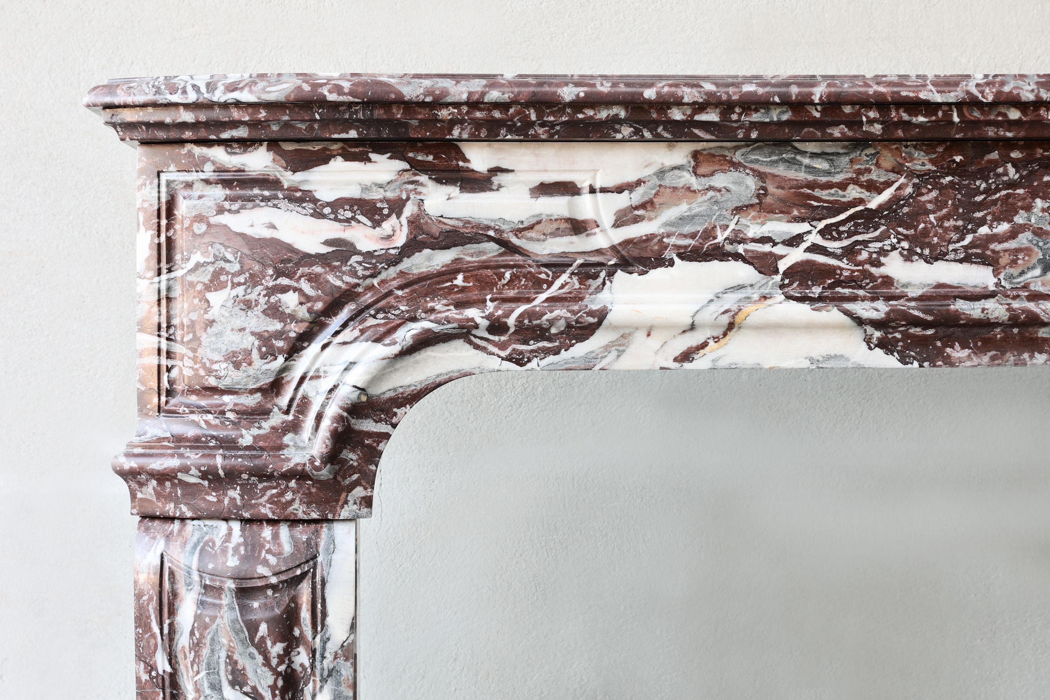 Louis XVI Antique mantel surround of Griotte de Campan rouge marble, style Louis XIV