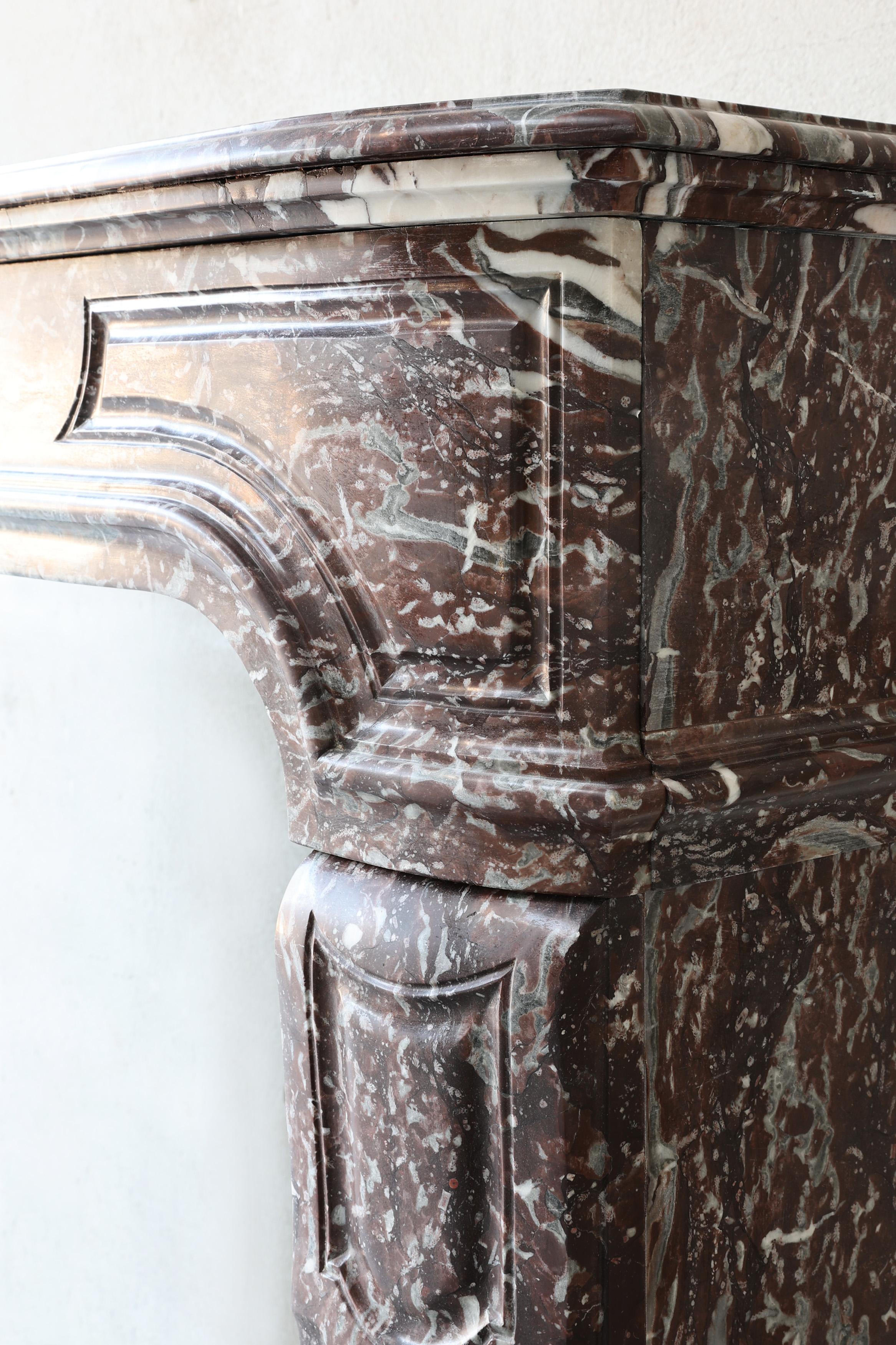 18th Century Antique mantel surround of Griotte de Campan rouge marble, style Louis XIV