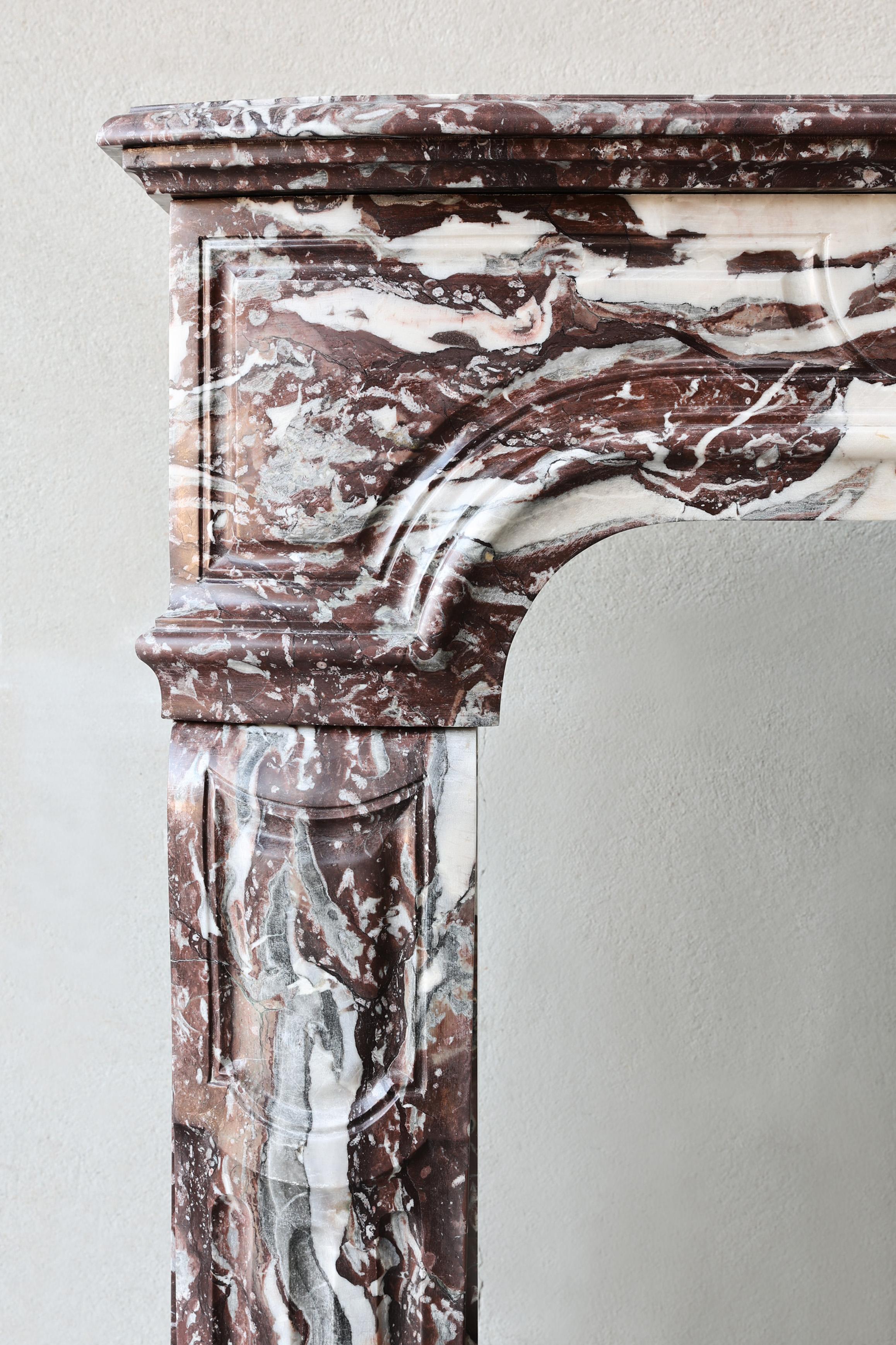 Marble Antique mantel surround of Griotte de Campan rouge marble, style Louis XIV