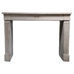 Cheminée ancienne du XIXe siècle, en pierre calcaire française, de style Louis XVI