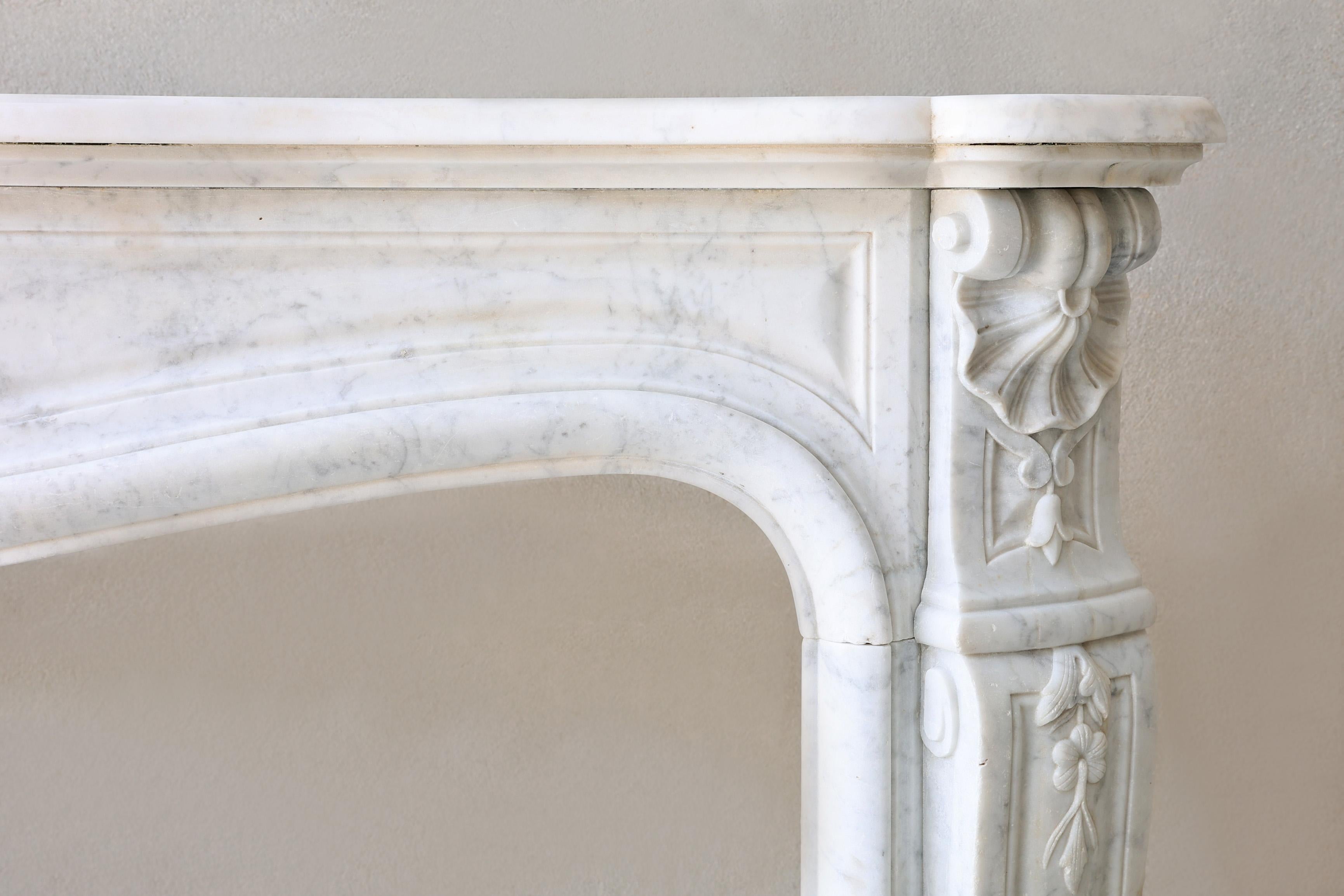 French Antique mantle surround of carrara marble in style of Louis XV, 19th century For Sale