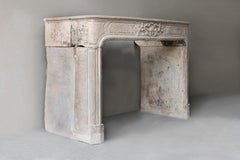 Antique mantle surround of French limestone from the 19th century, Louis XIV