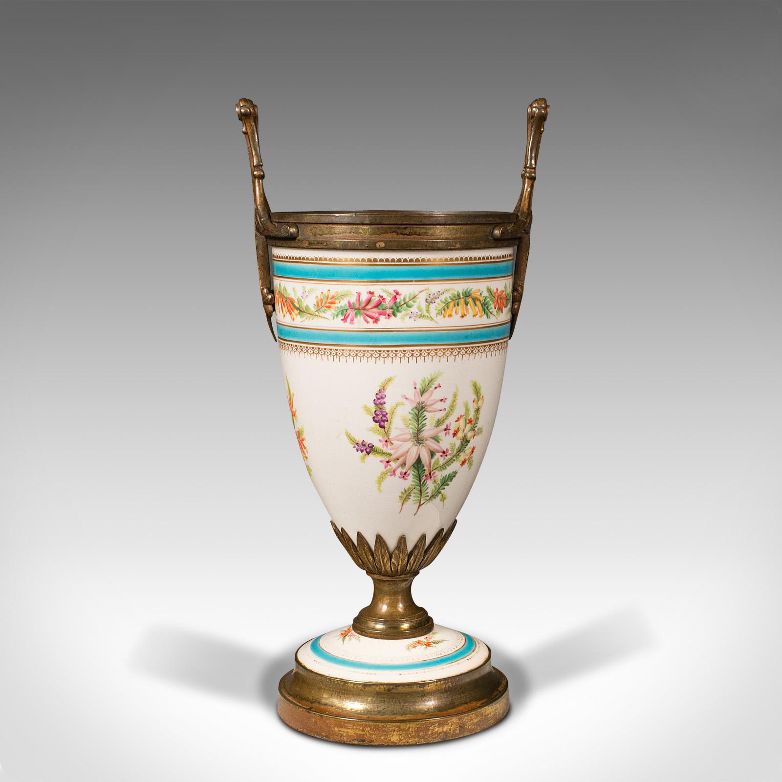 This is an antique mantlepiece jardiniere. A French, ceramic and gilt metal display planter, dating to the late Victorian period, circa 1900.

Distinctive form, with appealing colour and finish
Displays a desirable aged patina and in good