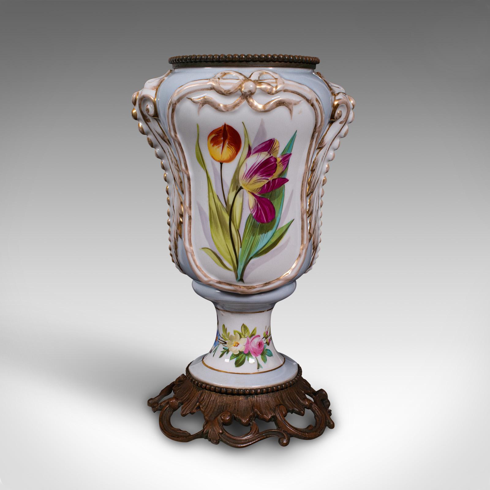 This is an antique mantlepiece vase. A French, ceramic and gilt metal display planter or jardiniere, dating to the late Victorian period, circa 1900.

Graceful of form, with attractive colour and decorations
Displays a desirable aged patina and in