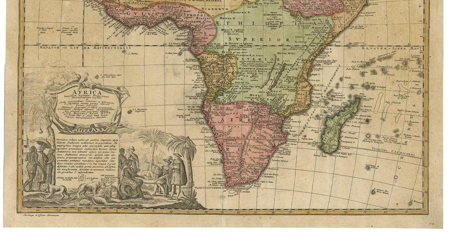 Nice example of the Homann family's second map of Africa, based upon the work of De L'Isle. The map is dominated by a beautiful cartouche showing Europeans, Africans, and various African animals with views of Cape Town, South Africa.