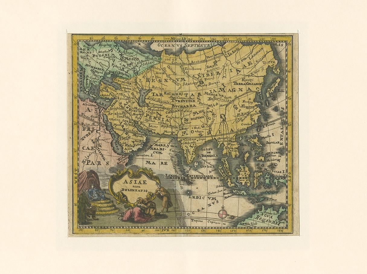 Antique map titled 'Asiae Nova delineatio'. Rare miniature map of Asia. This map covers the entirety of Asia from Europe to Japan and from the Arctic to New Holland or Australia. The mythic lake of Chiamay, speculated to be the source of the five