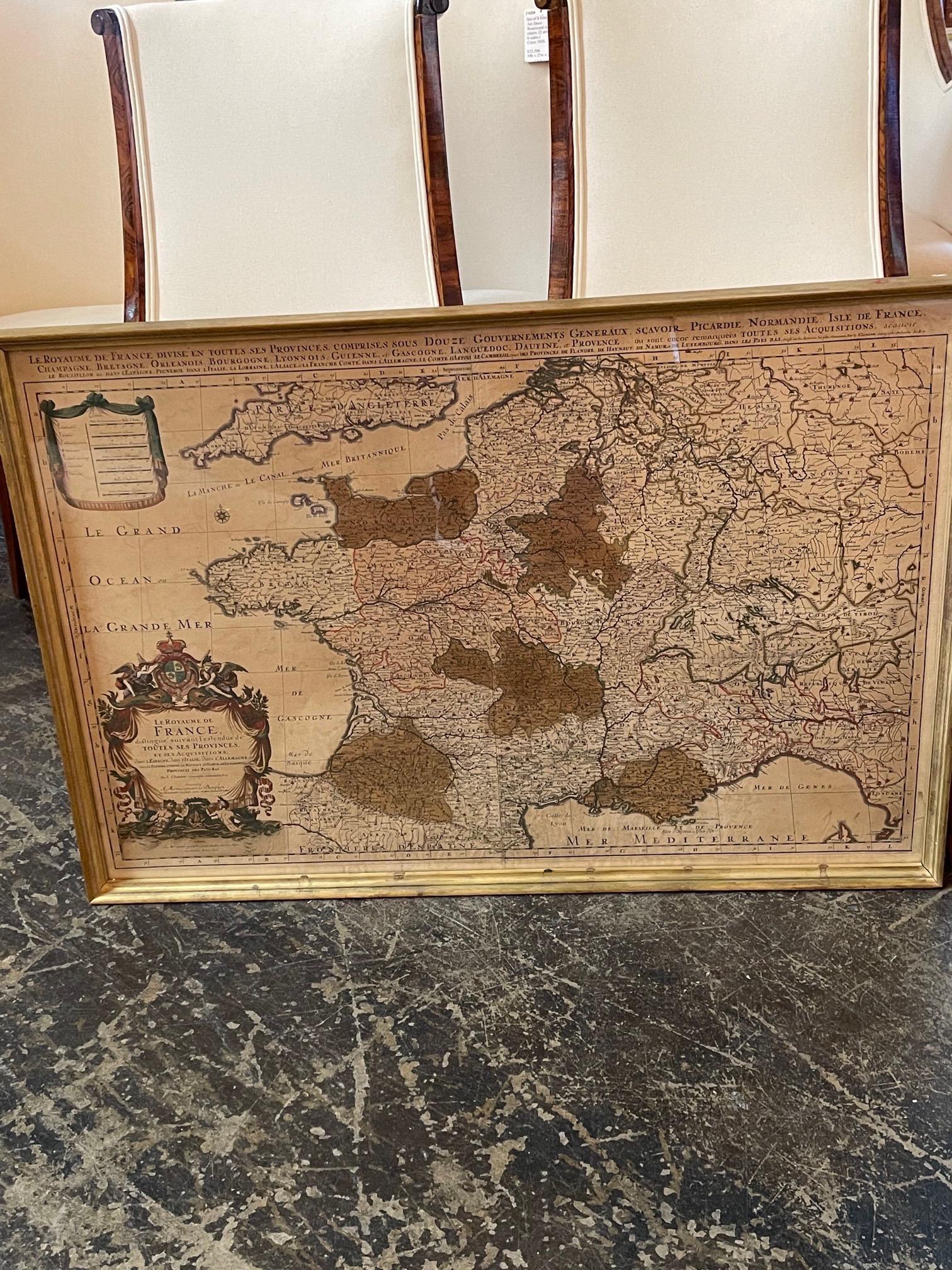 Nice antique map of France in wood frame. This would make a great gift for a collector. A wonderful accessory!