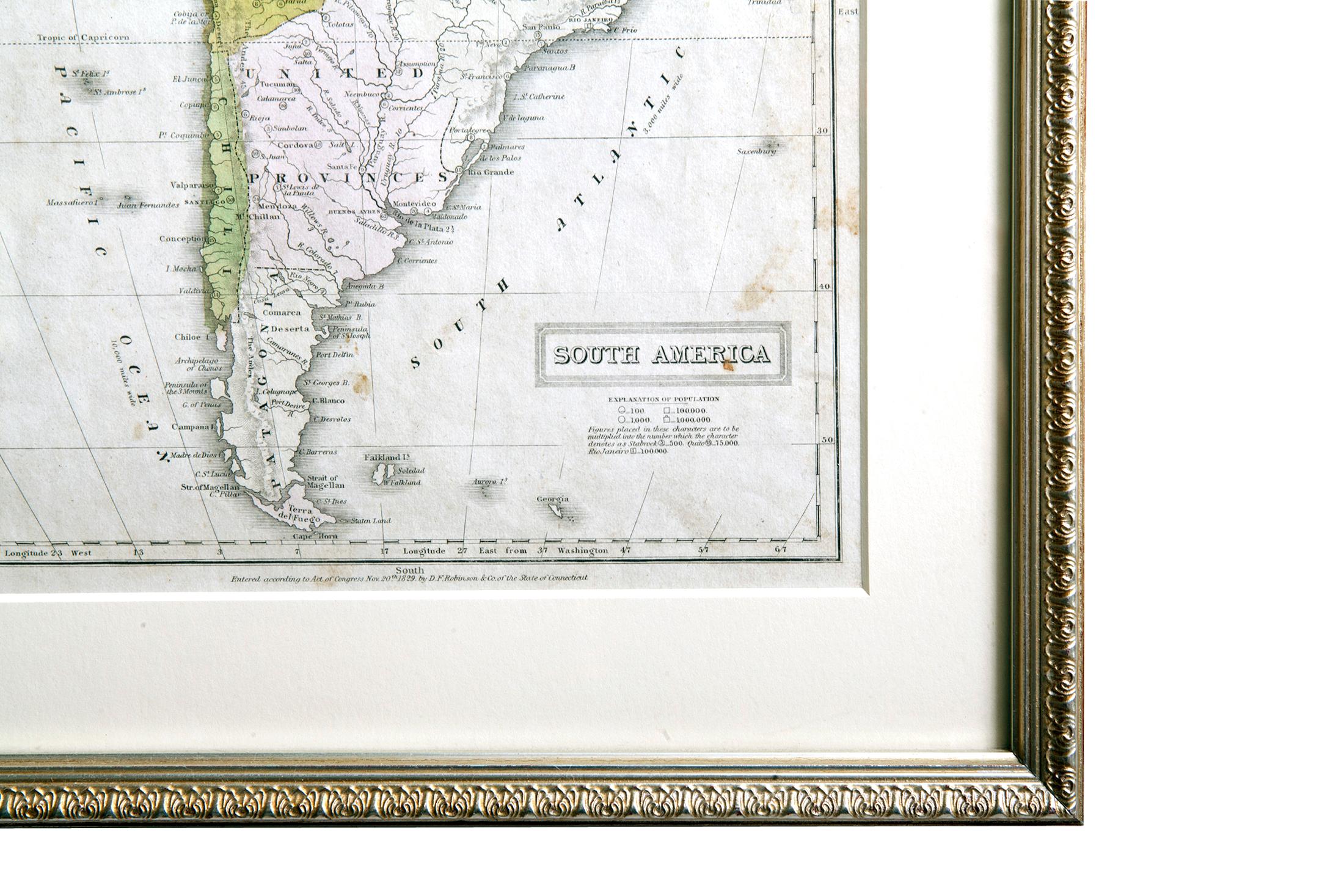 Antique map of South America. Displayed in a new Roma frame with museum quality matting. Custom frame in platinum. No print date, but certification guarantees this hand colored map to be at least 100 years old.