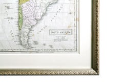 Mapa antiguo de Sudamérica en marco romaní