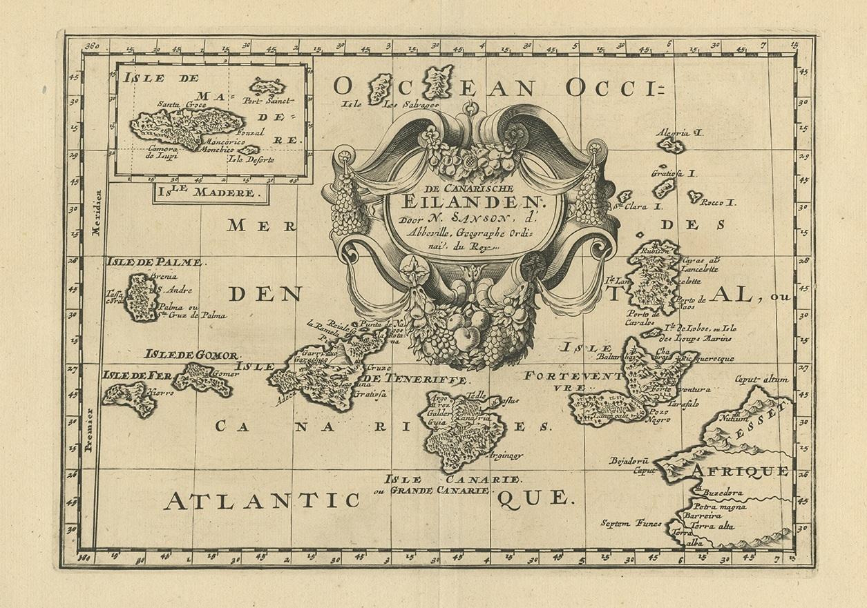 Antique map titled 'De Canarische Eilanden'. Engraved map of the Canary Islands (or Canaries) off the coast of Cape Bojador in West Africa. The island of Madeira is included in a small inset map at the top. The map is graced with an elaborate,