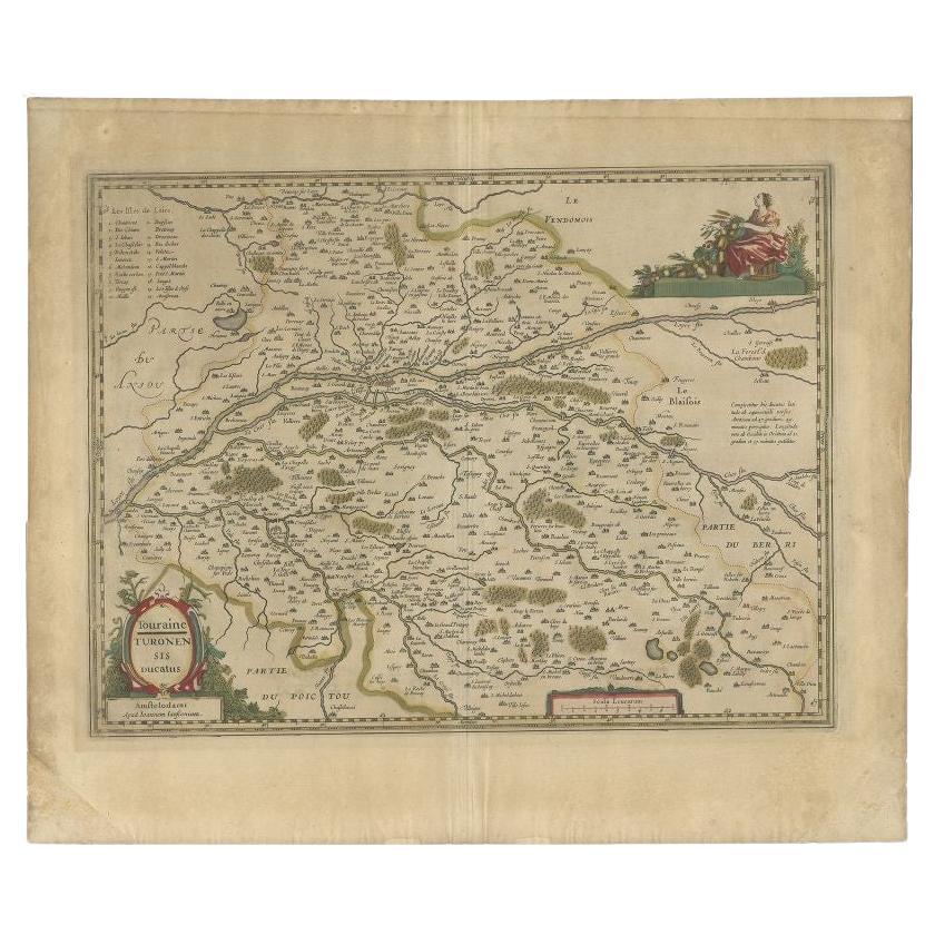 Antique map titled 'Touraine - Turonensis Ducatus'. 

Decorative map of the Touraine region. This map originates from 'Atlas Novus, Sive Theatrum Orbis Orbis Terrarum: In quo Galliae, Helvetiae (..)' by J. Janssonius (1656-1657). 
 
Artists and