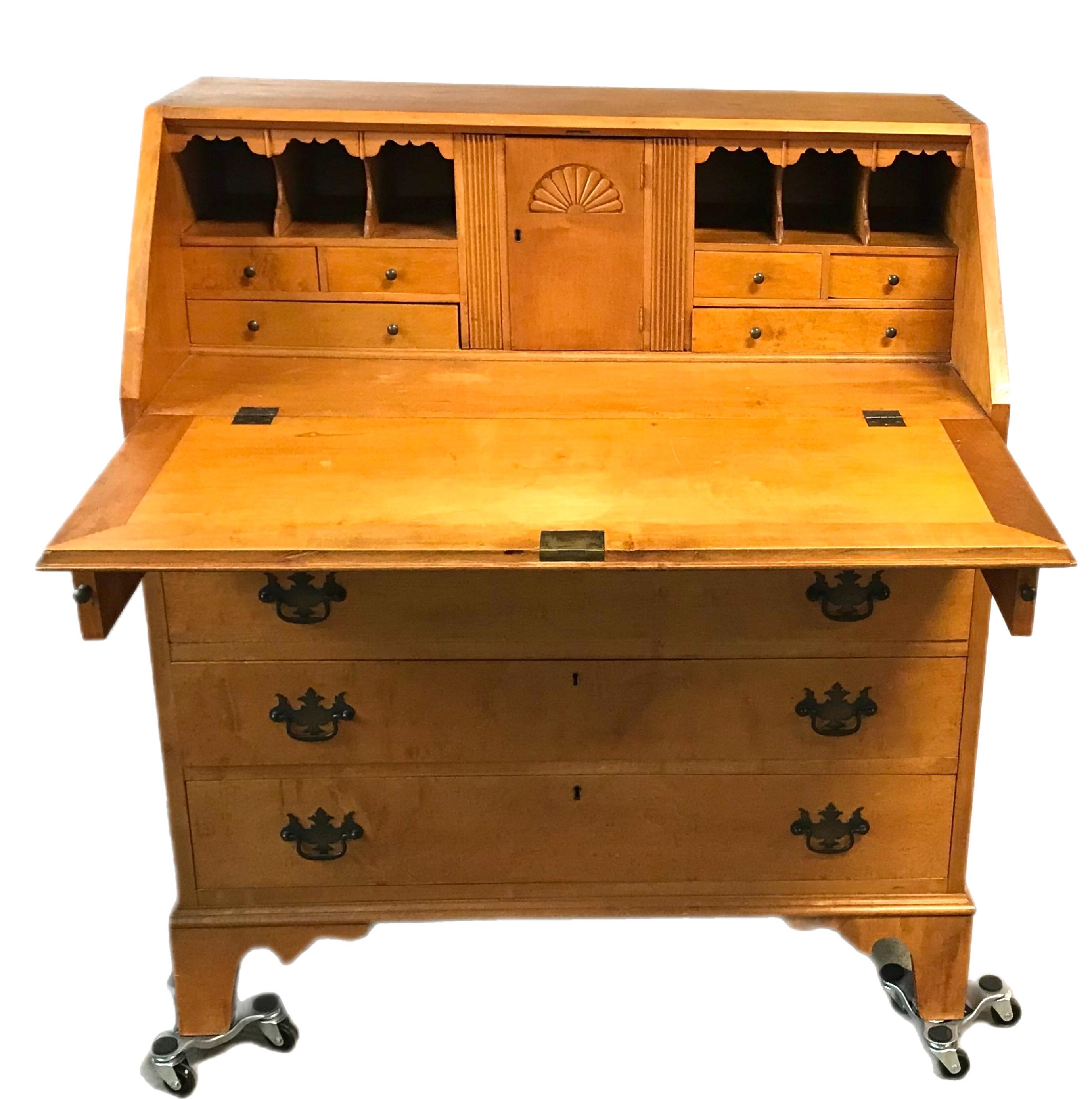 Beautifully crafted antique 4 drawer slant front desk. The exterior is in very nice original condition, the secondary woods have all been replaced with an eye to detail with dovetailing construction.