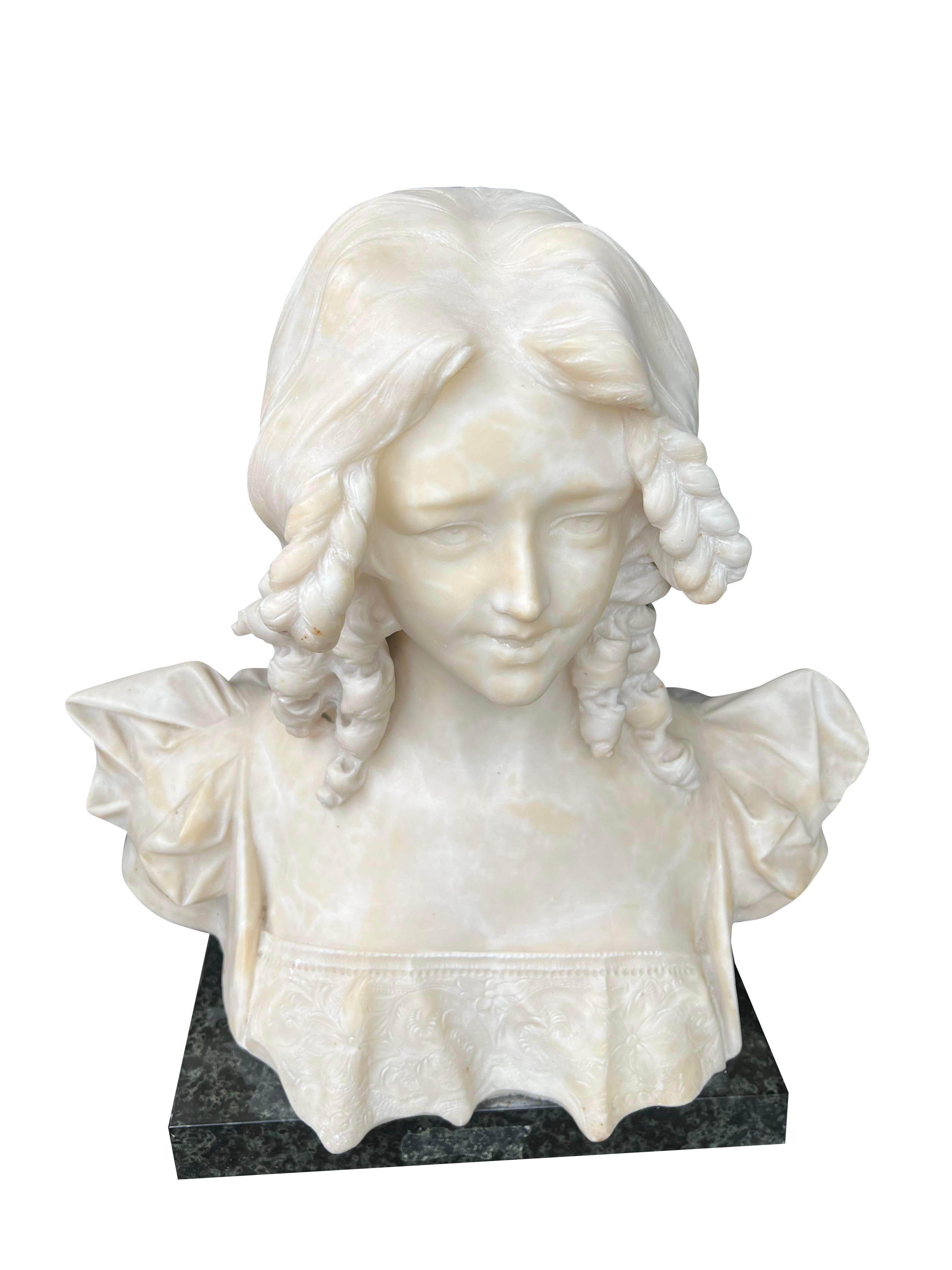 Antique Marble Alabaster Bust Carved Stone Sculpture Woman

This antique marble alabaster bust is a stunning piece of carved stone sculpture.
The intricate details and realistic portrayal of the woman's features make it a true work of art.
The
