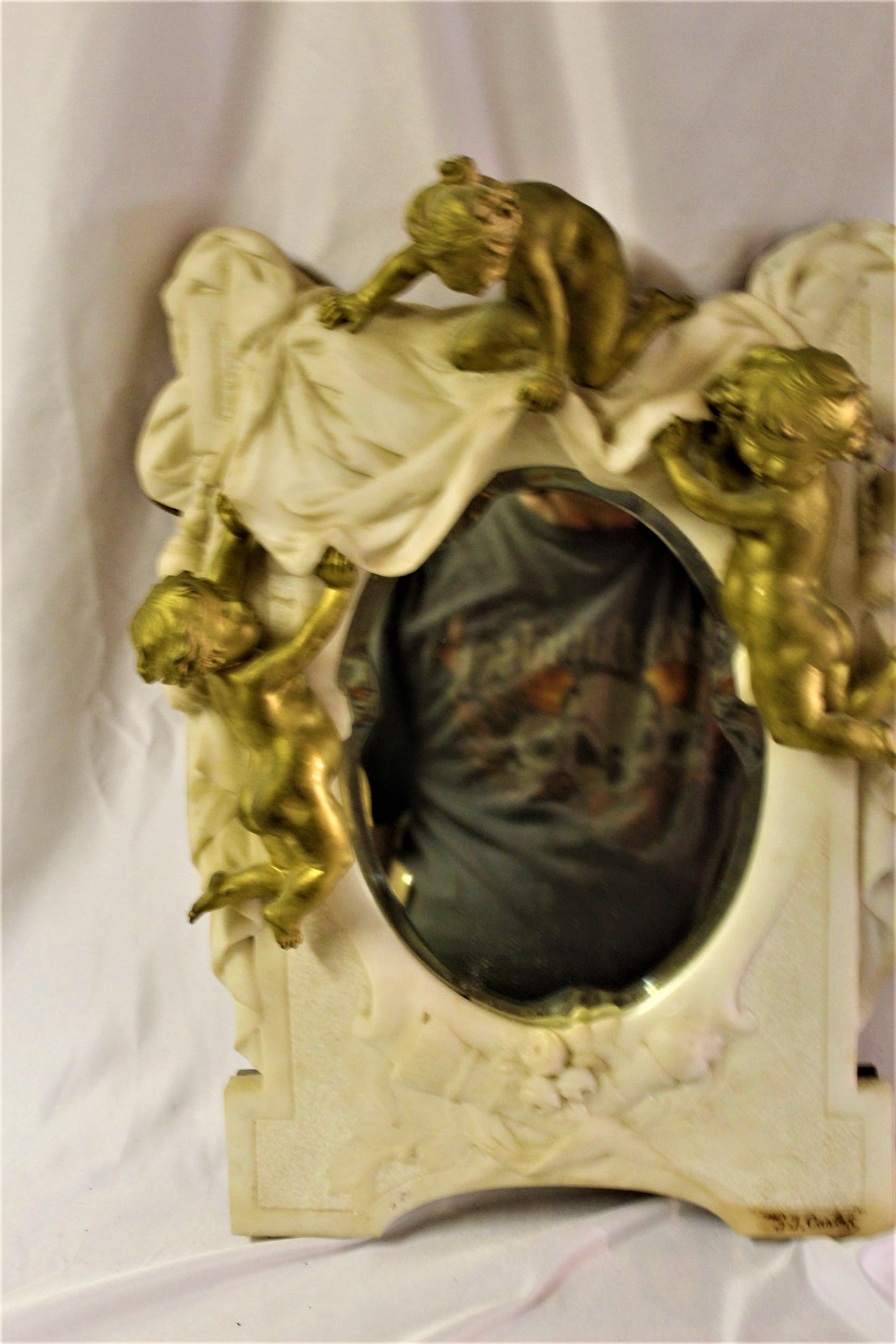 Baroque Antique Marble and Cherub Mirror, Doré Gold Finish Signed For Sale