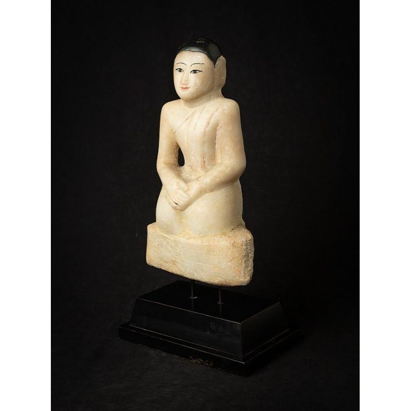 Material: marble
47,5 cm high 
25,4 cm wide and 15,3 cm deep
Weight: 9.363 kgs
With Burmese inscriptions in the base
Originating from Burma
19th century

