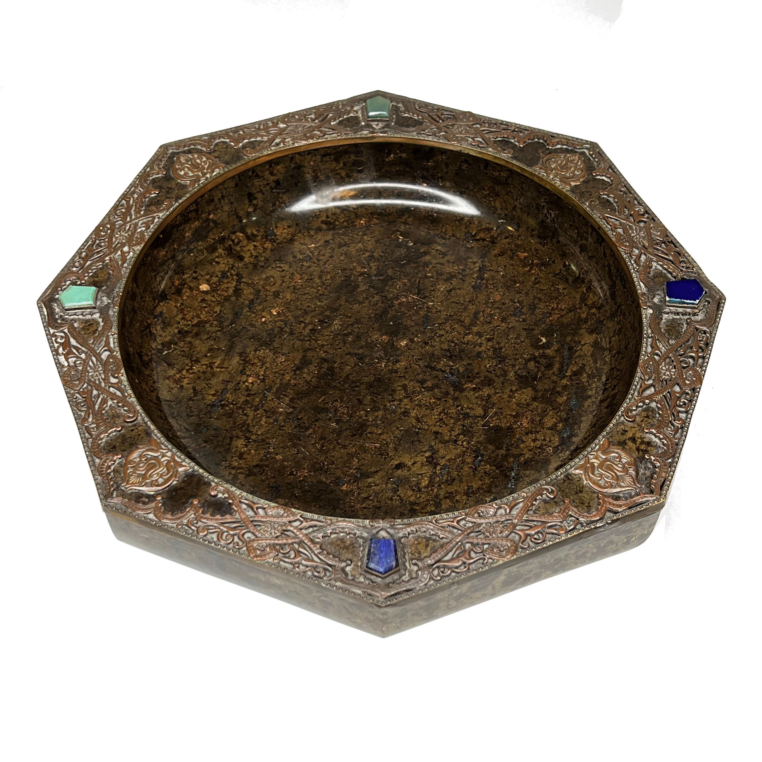 Our massive octagonal-shaped brown marble cigar tray in the Renaissance style is attributed to E.F. Caldwell, and features applied Arabesque copper designs around the rim, plus turquoise and lapis lazuli colored stones.