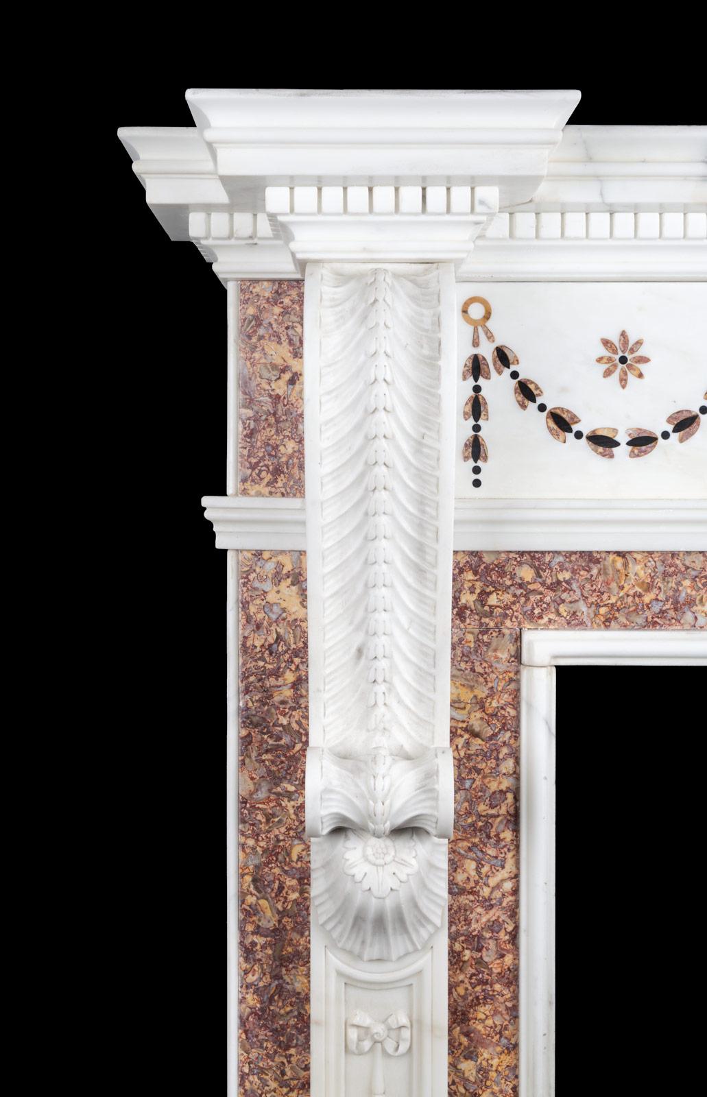 The carved urn centre tablet is flanked by frieze panels inlaid with black, Brocatelle and Sienna marbles, the inlay depicts chains of bell-flowers upheld by corner rings and centre bows. Long elegant scroll corbels are above pilasters carved with