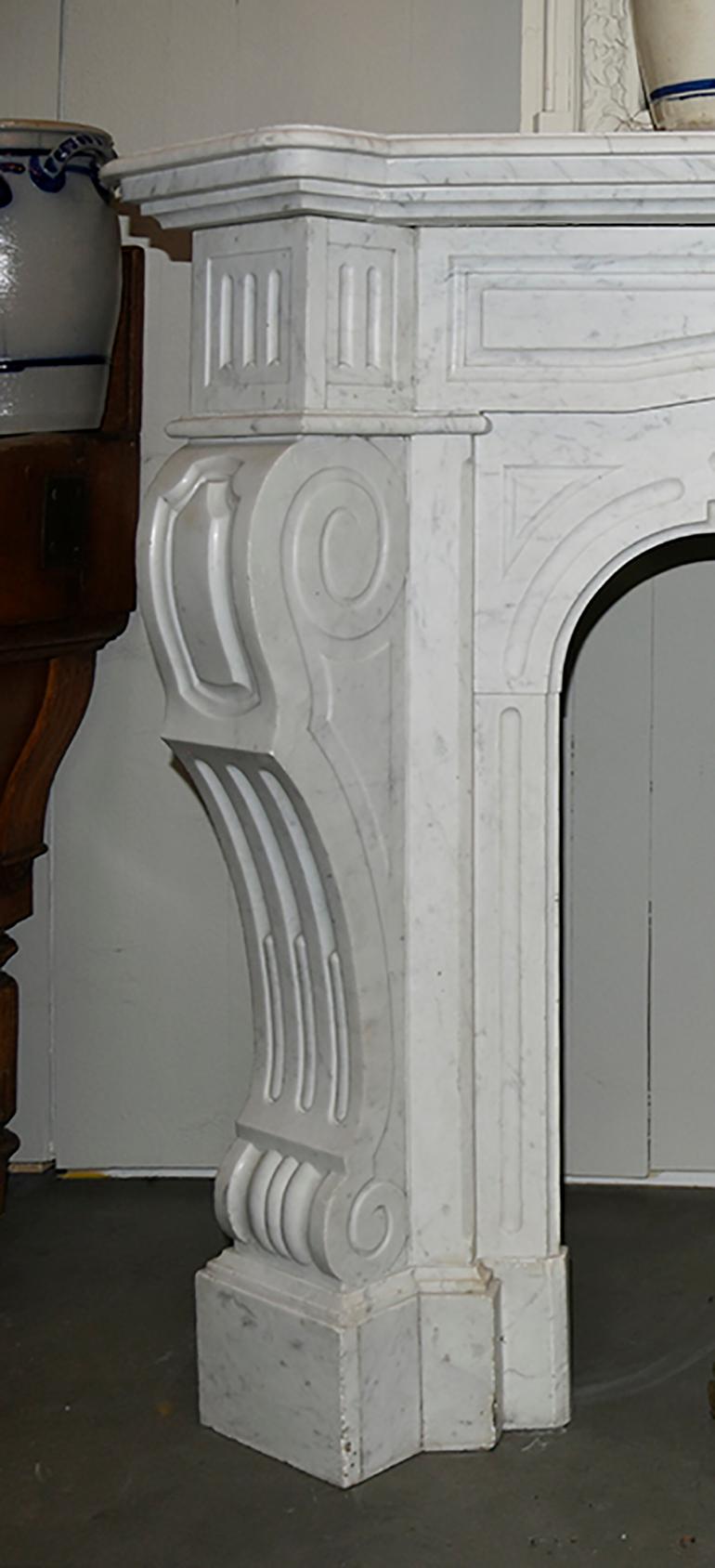 A very exclusive antique fireplace mantel recuperated out of 
a mansion near Amsterdam, the Netherlands.

It is made out of white Carrara marble and should be placed
in front of the chimney.