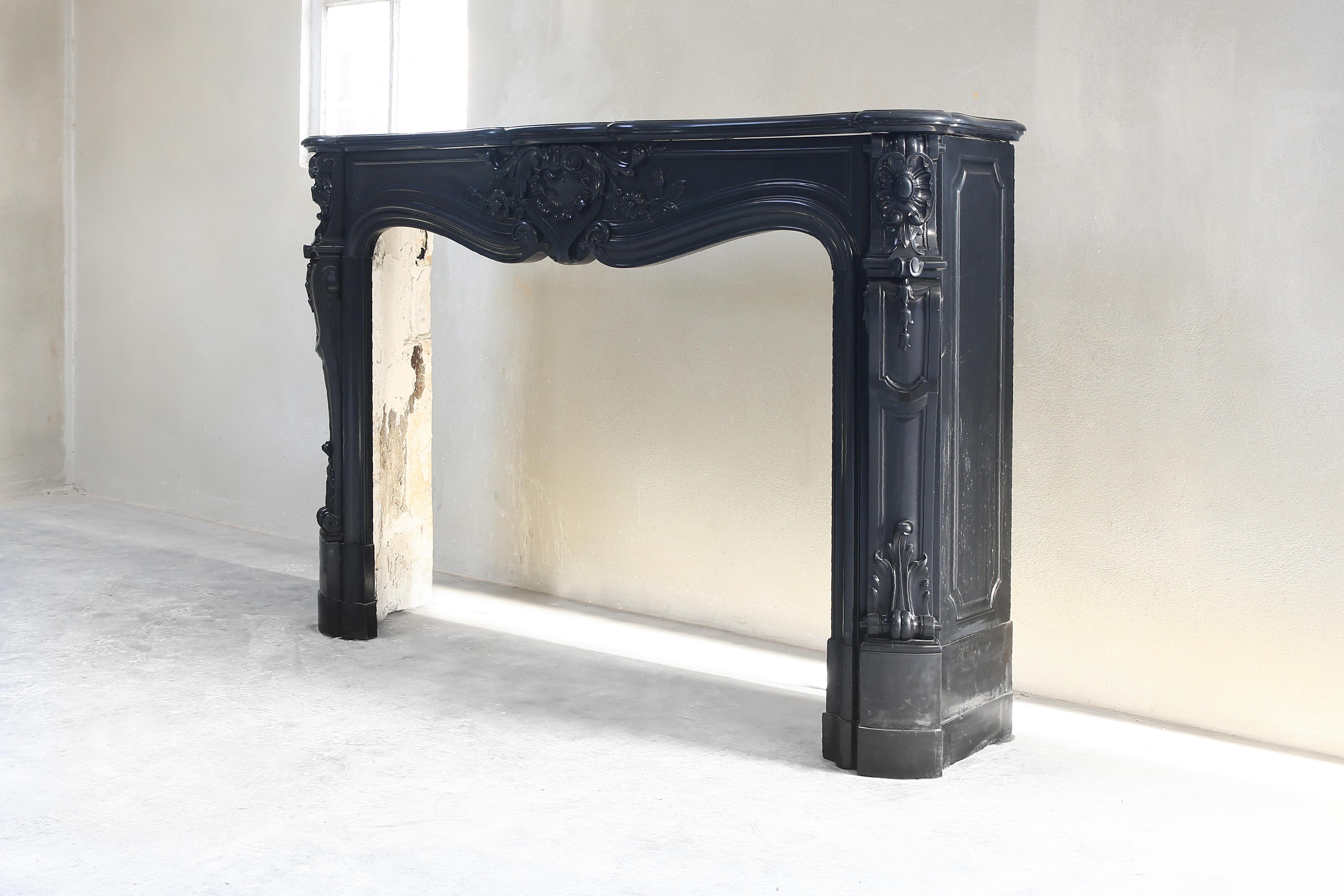 Antique Marble Fireplace, Noir De Mazy, Louis XV, 19th Century In Good Condition For Sale In Made, NL