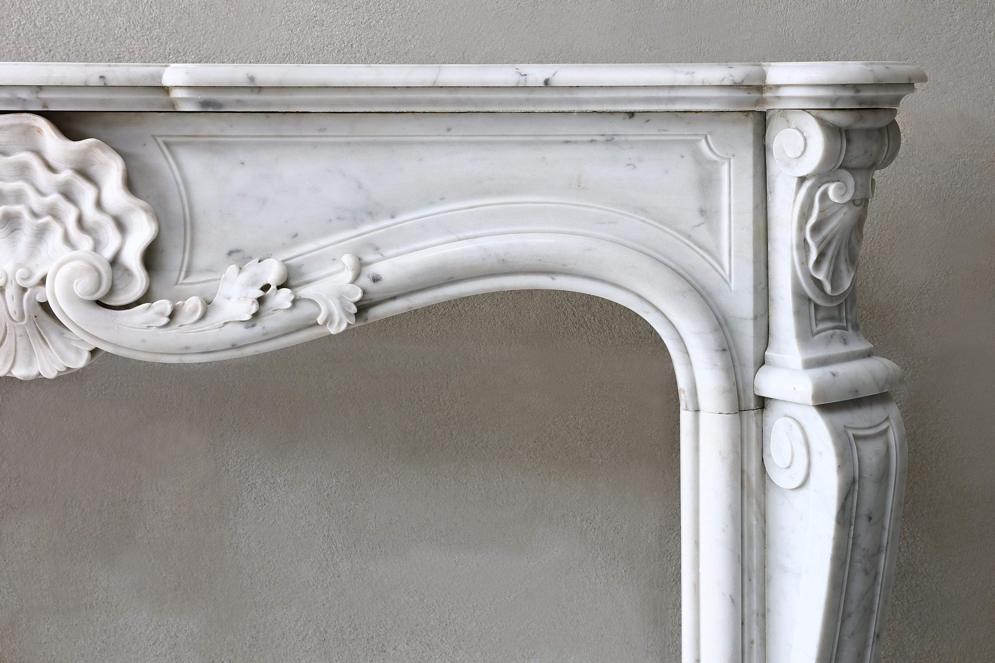 French Antique Marble Fireplace of Carrara Marble from 19th Century Style Louis XV