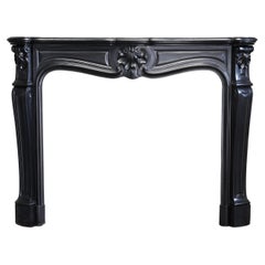 antique marble fireplace of Noir de Mazy marble in style of Louis XV 19 cent