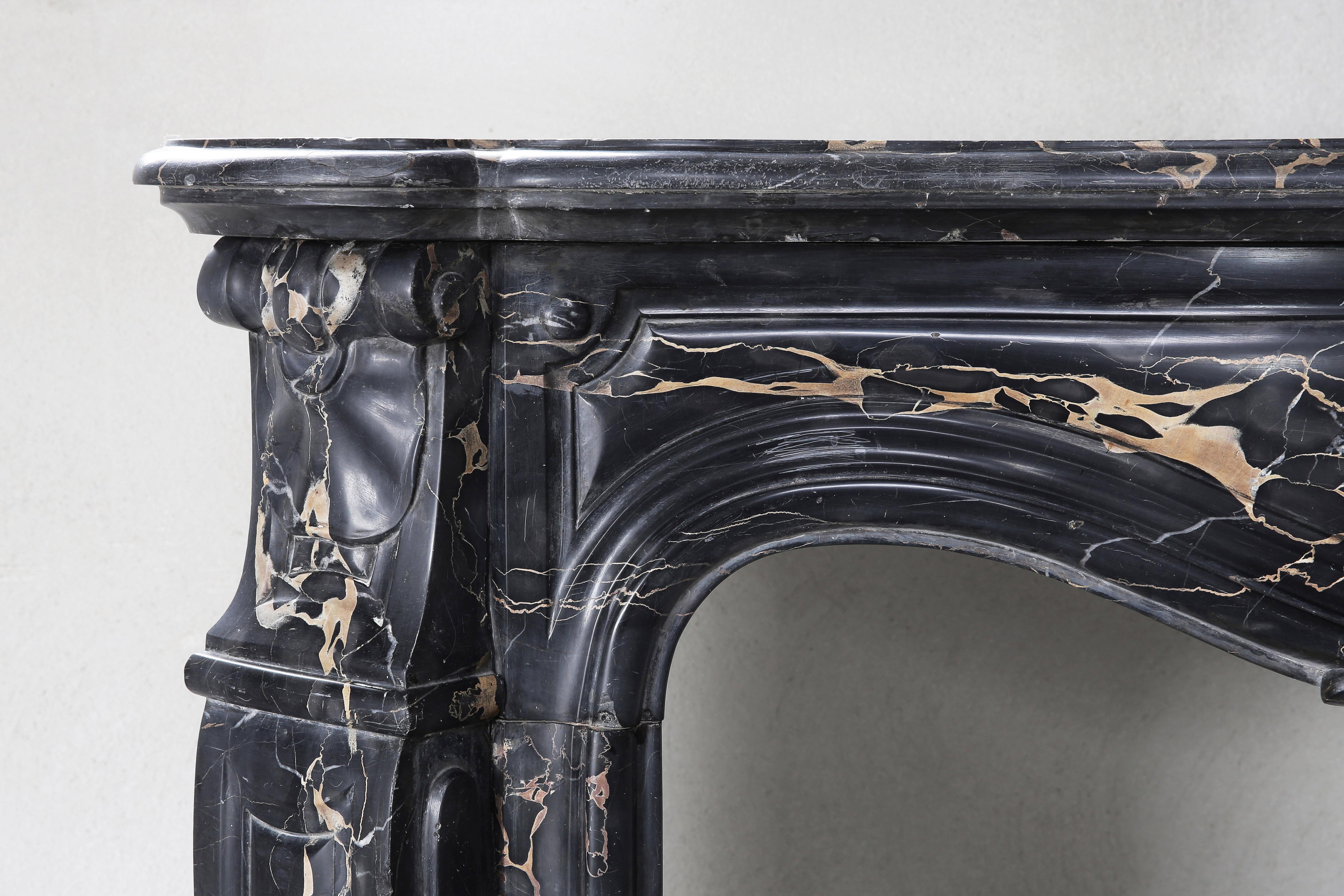 French Antique Marble Fireplace of Portoro Marble, 19th Century, Louis XV Style For Sale