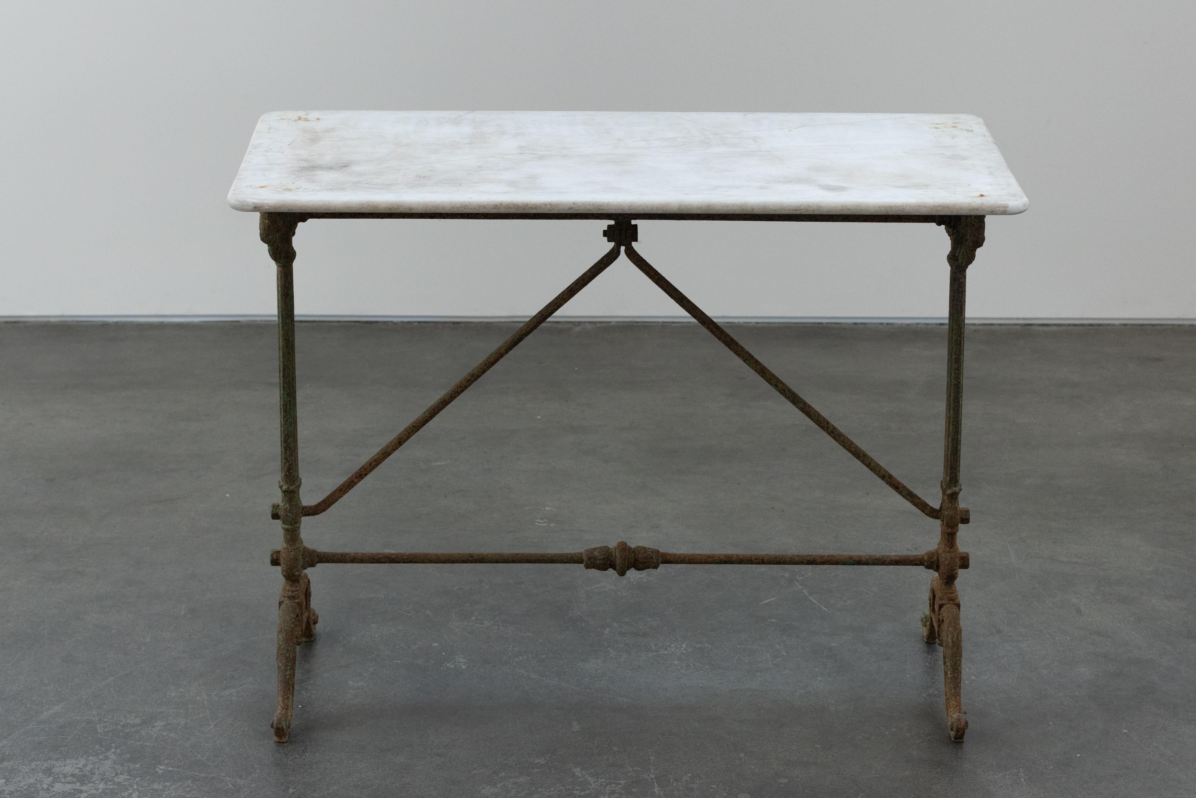 Antique Marble Garden Table From France, Circa 1850.  Solid cast iron base with nice original paint.  Solid marble top with light patina and use.