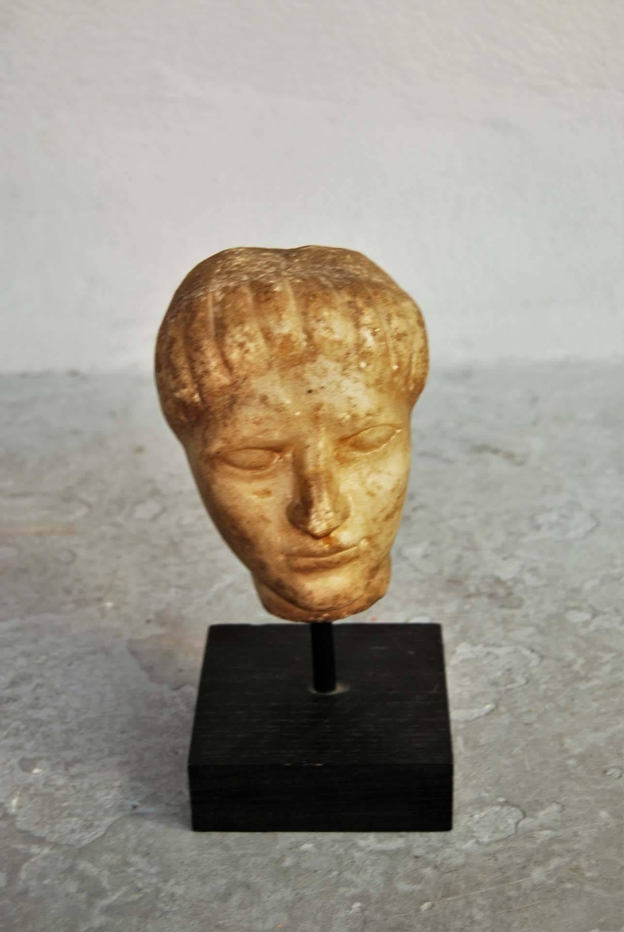 Impressive antique marble head sculpture.
Dimensions: Height 17 cm, diameter 11 cm.

  